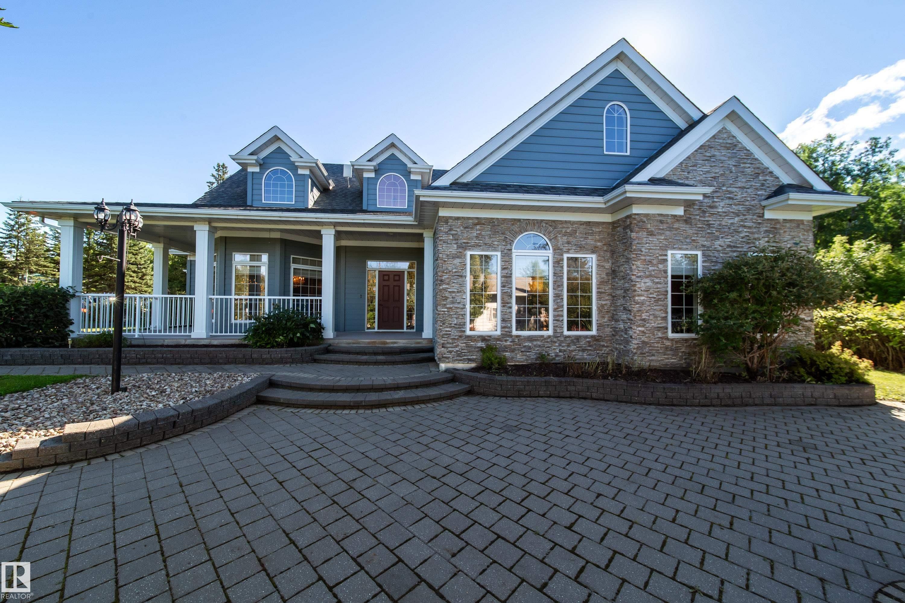 2A Silver Beach Road, Rural Wetaskiwin County, AB - Outdoor With Deck Patio Veranda With Facade