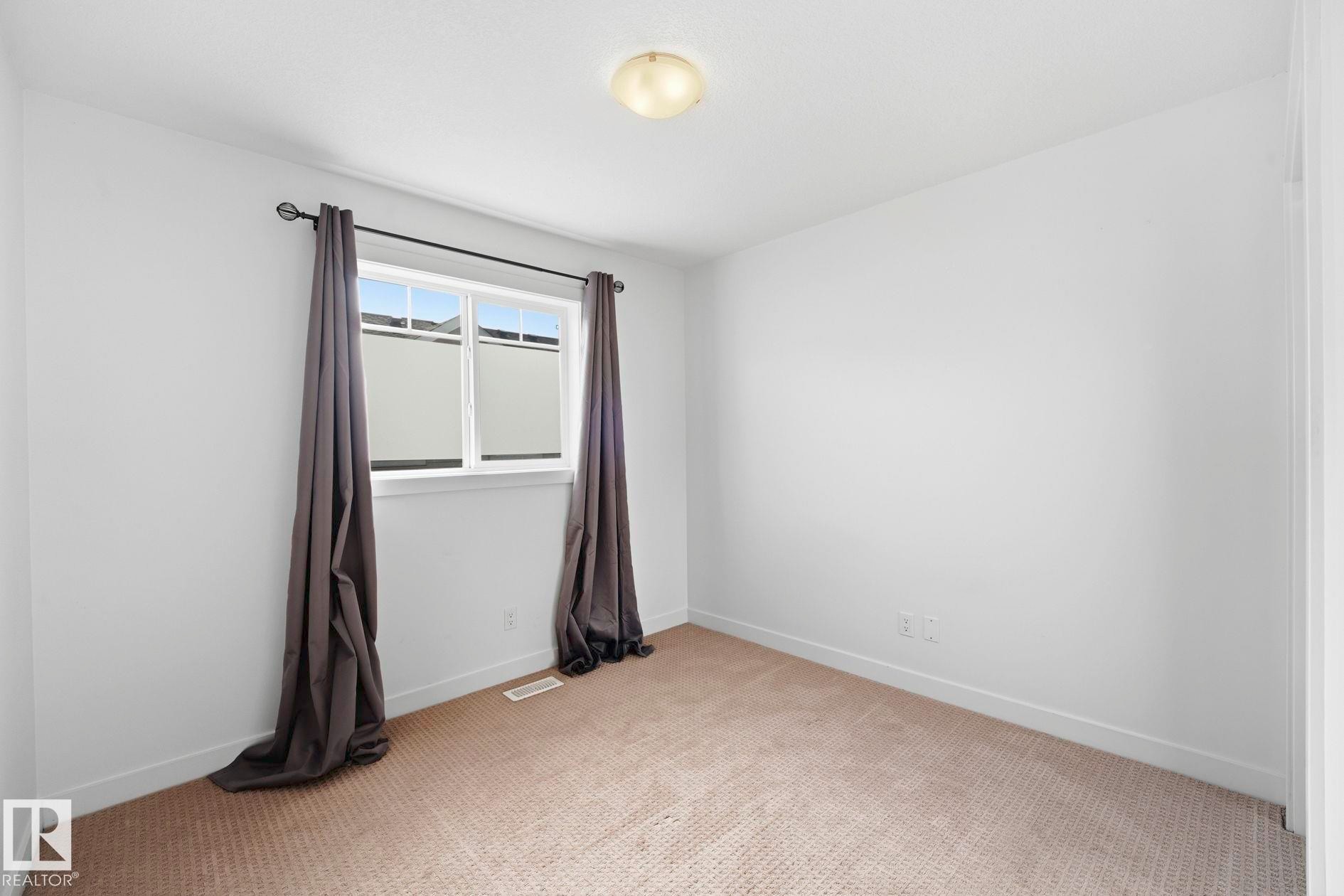 #18 13810 166 Av Nw, Edmonton, AB - Indoor Photo Showing Other Room