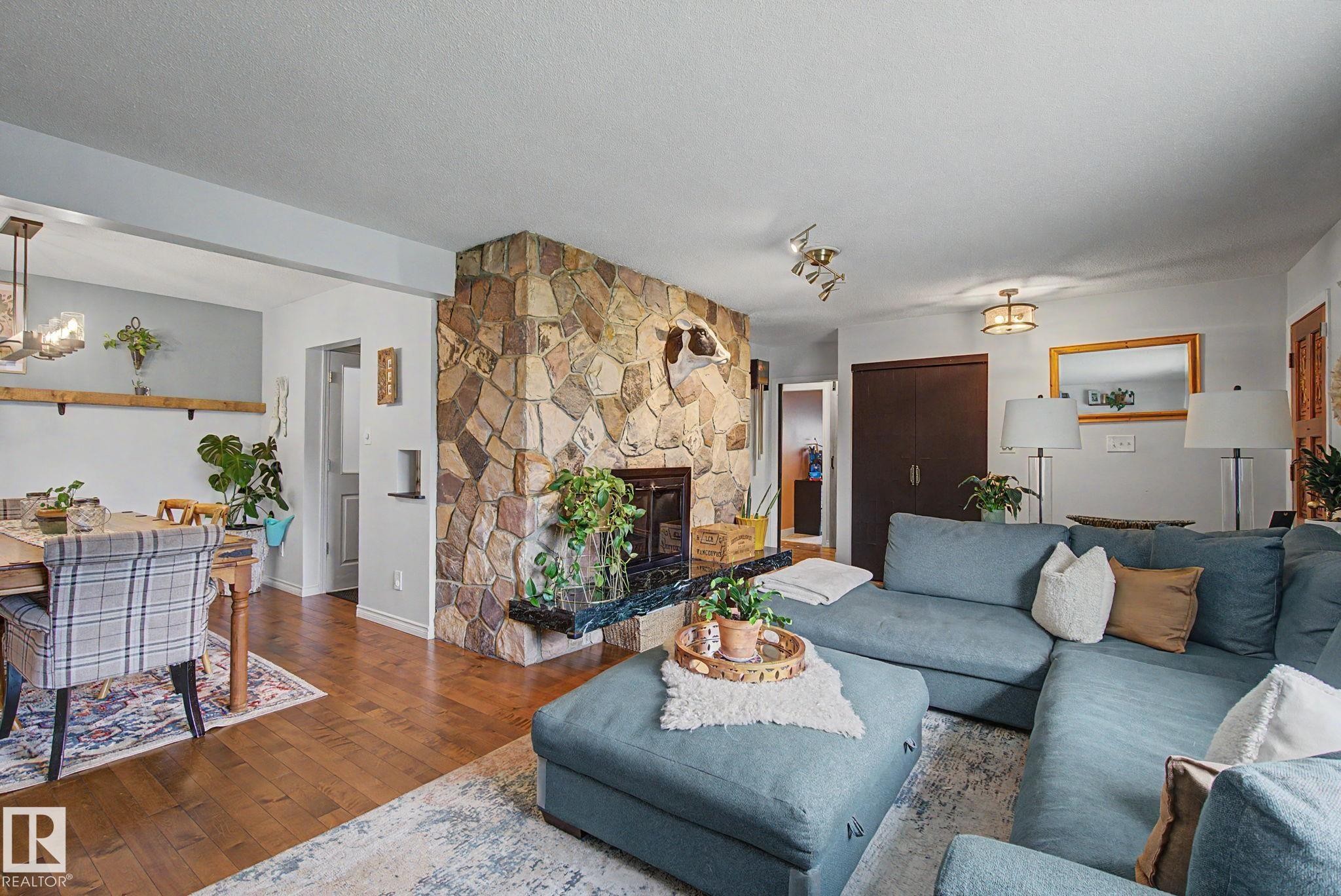 7712 159 Street Nw, Edmonton, AB - Indoor Photo Showing Living Room With Fireplace
