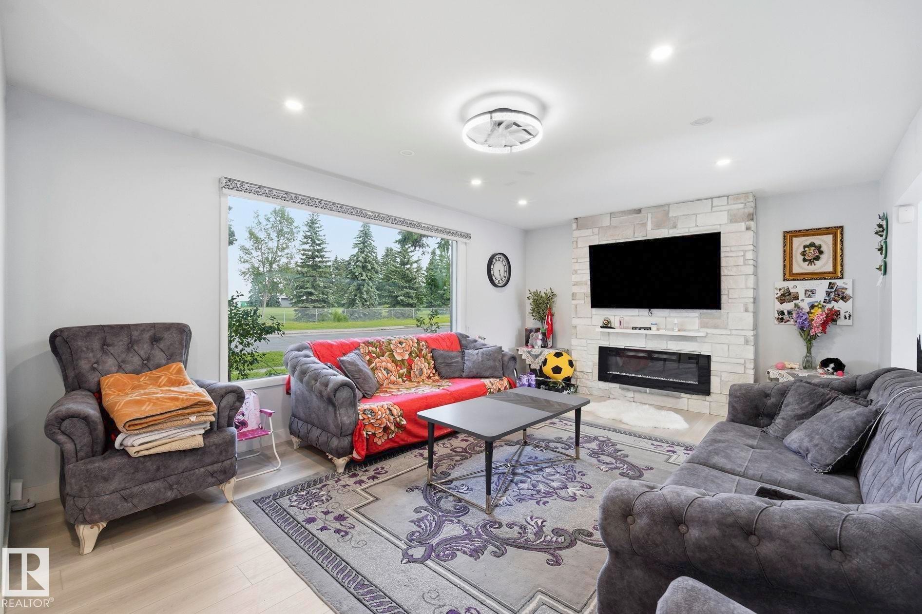 9302 165 Street Nw, Edmonton, AB - Indoor Photo Showing Living Room With Fireplace