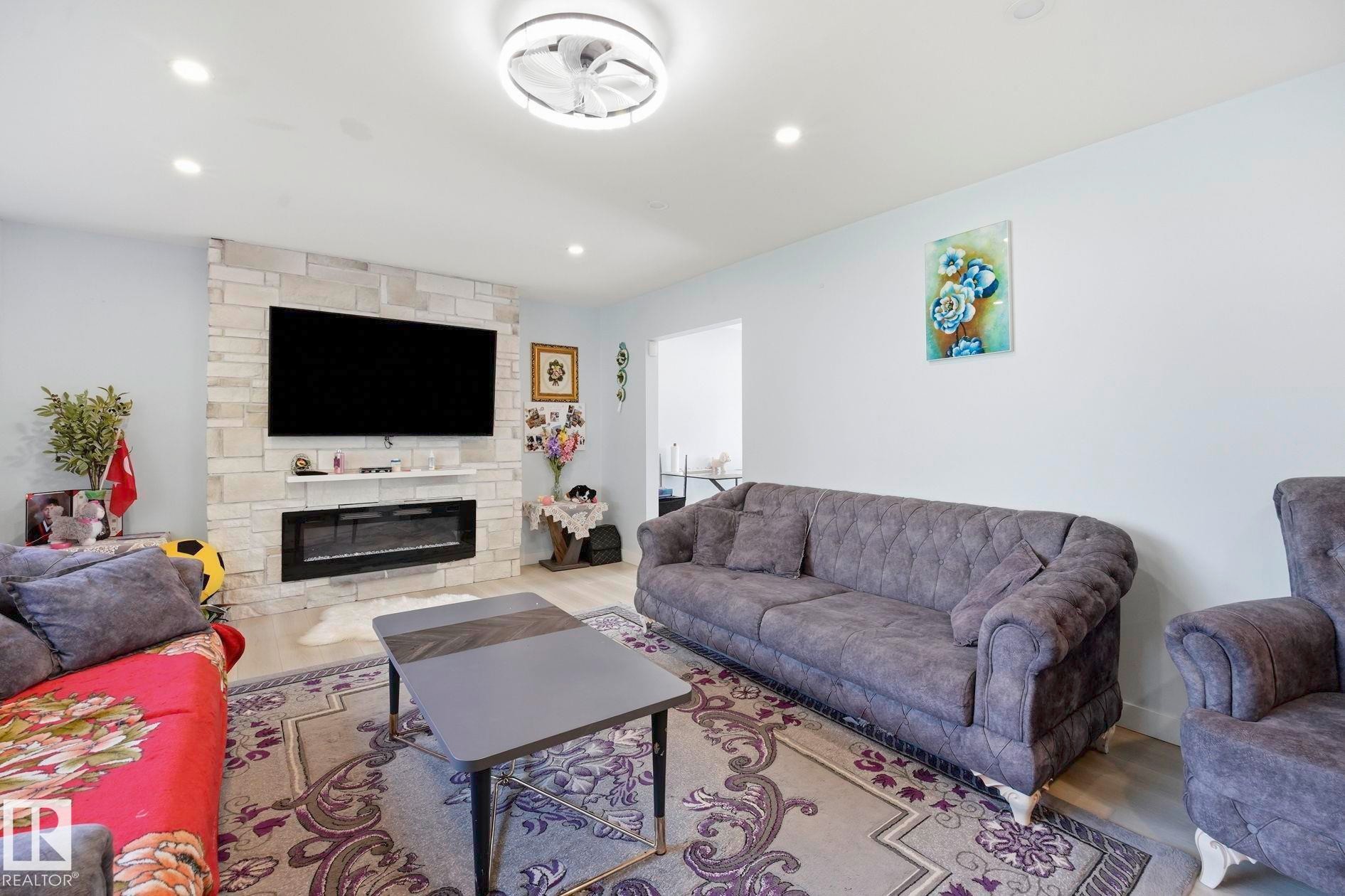9302 165 Street Nw, Edmonton, AB - Indoor Photo Showing Living Room With Fireplace