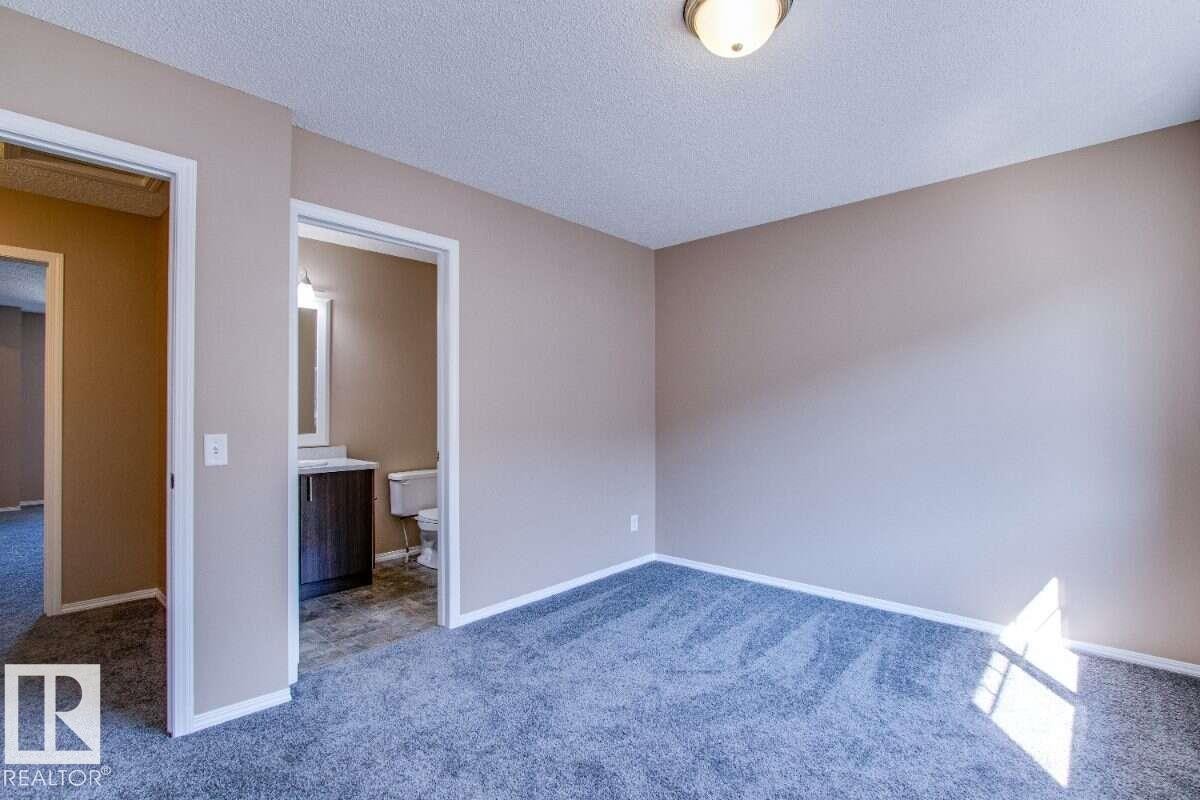 #15 8304 11 Av Sw, Edmonton, AB - Indoor Photo Showing Other Room