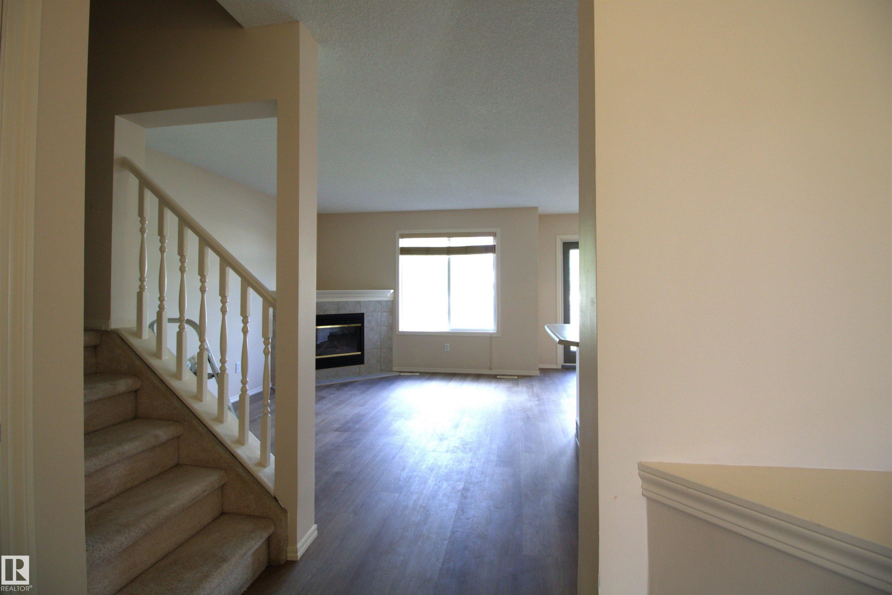 #26 13403 Cumberland Rd Nw, Edmonton, AB - Indoor Photo Showing Other Room With Fireplace