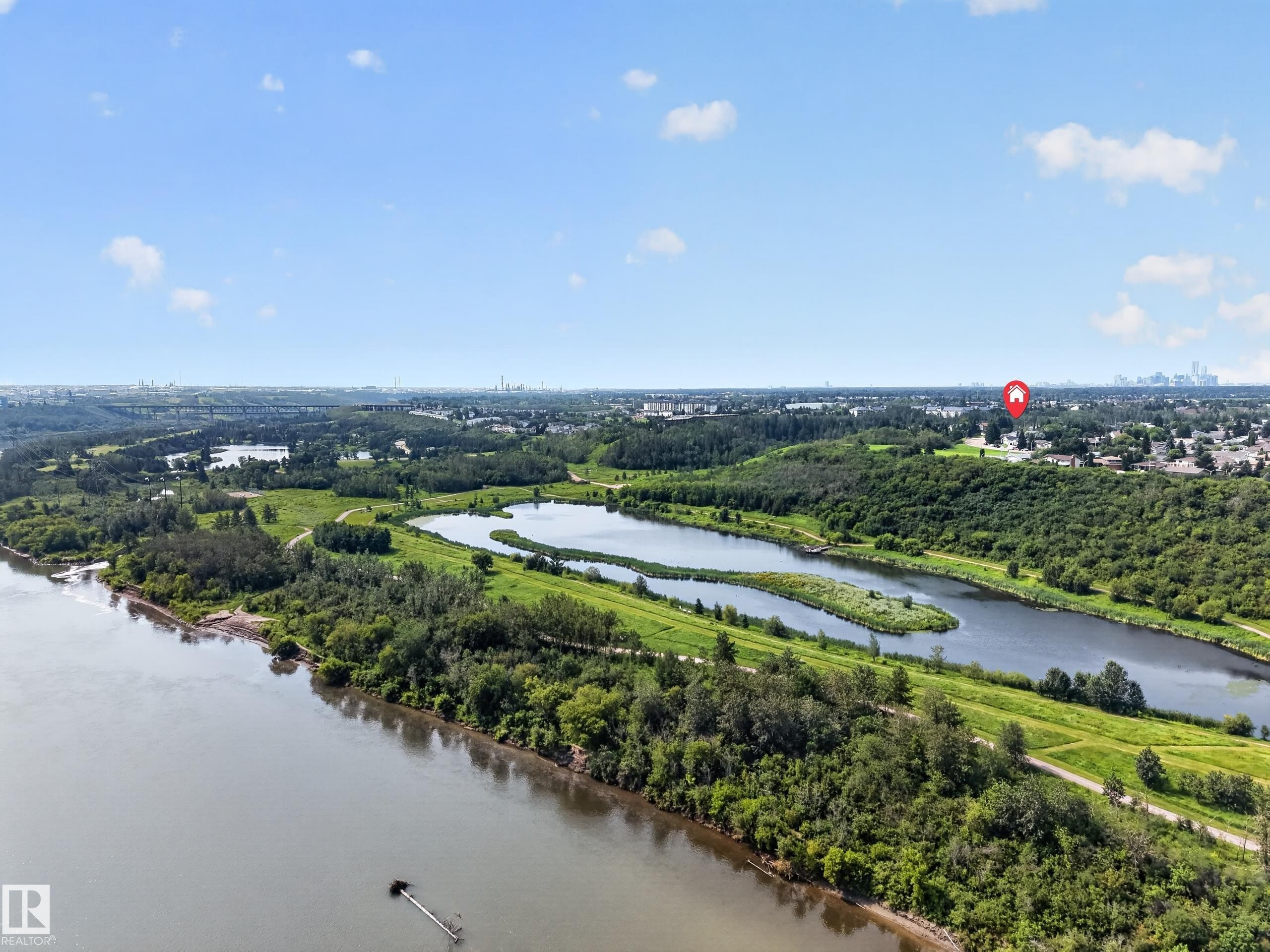 Expansive natural landscape featuring a prominent river, multiple serene lakes, dense mature trees, and open green spaces - 156 Clareview Road Nw, Edmonton, AB - Outdoor With Body Of Water With View