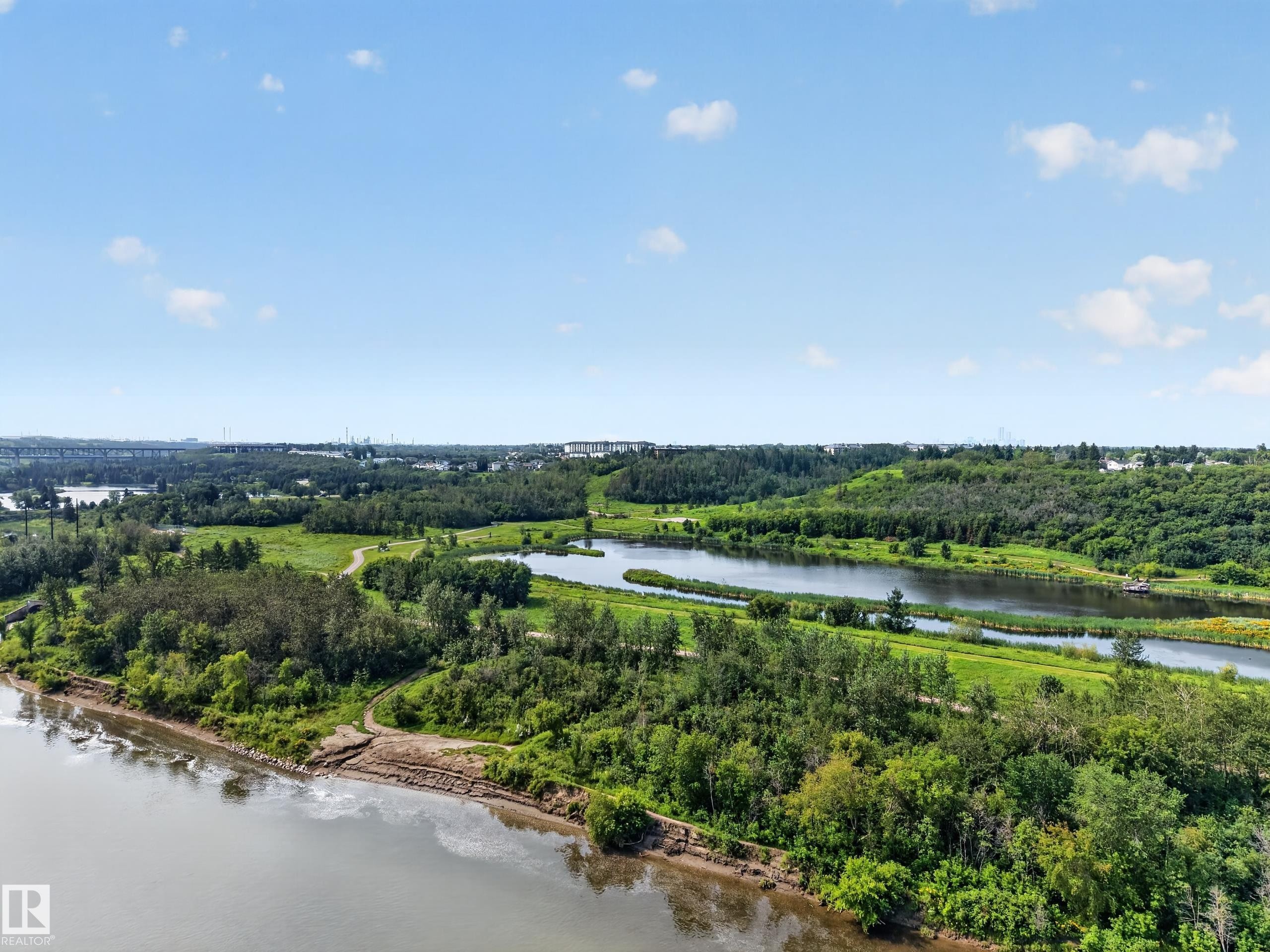 Expansive natural landscape featuring a prominent river, multiple waterways, and abundant mature trees - 156 Clareview Road Nw, Edmonton, AB - Outdoor With Body Of Water With View