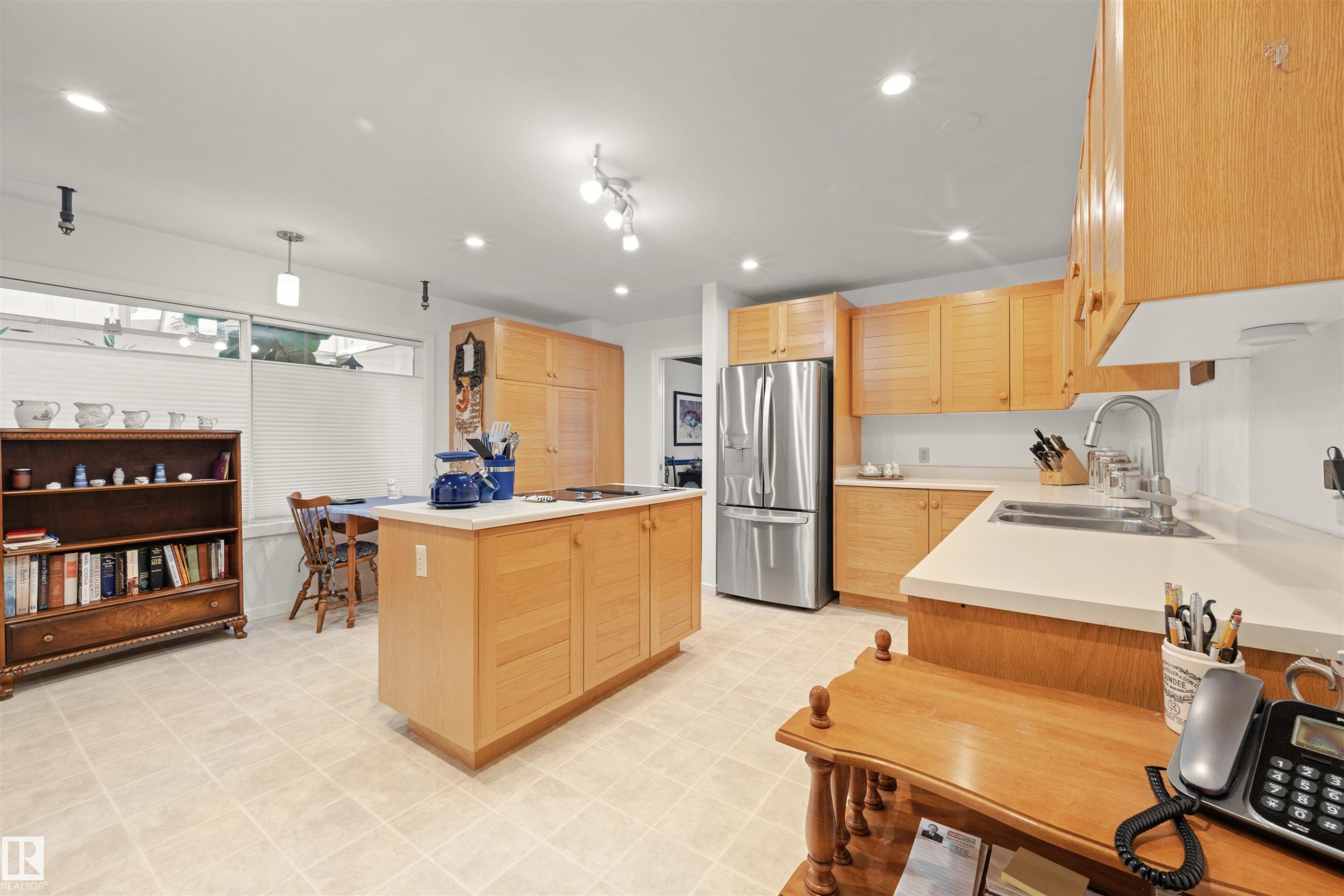 #1 14824 45 Av Nw, Edmonton, AB - Indoor Photo Showing Kitchen With Double Sink