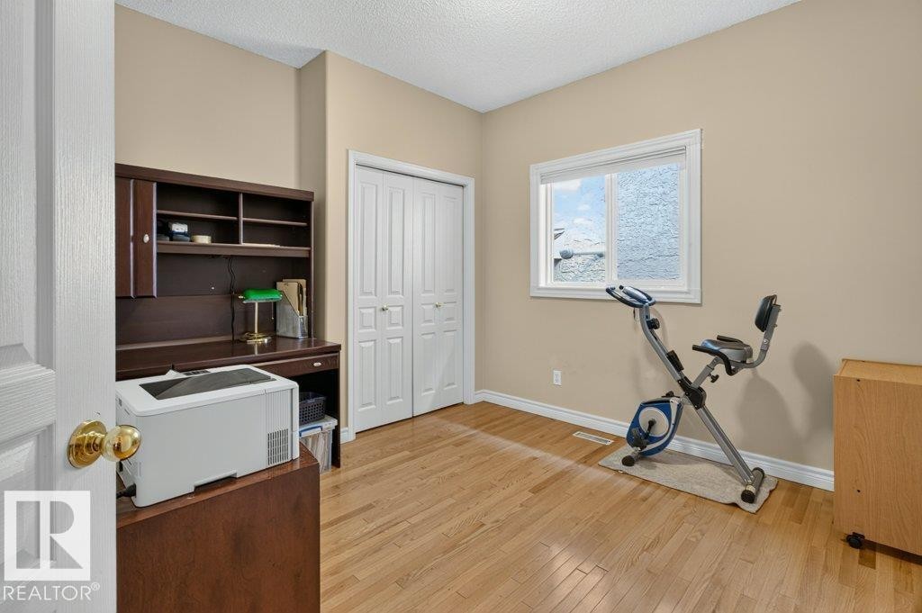 925 Burrows Crescent Nw, Edmonton, AB - Indoor Photo Showing Gym Room