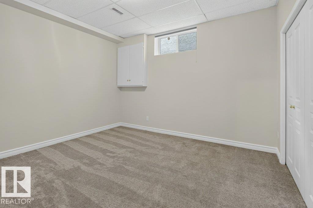 925 Burrows Crescent Nw, Edmonton, AB - Indoor Photo Showing Other Room