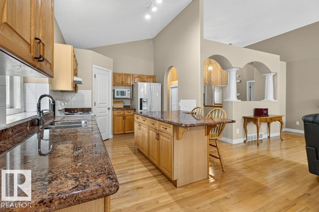 925 Burrows Crescent Nw, Edmonton, AB - Indoor Photo Showing Kitchen With Double Sink