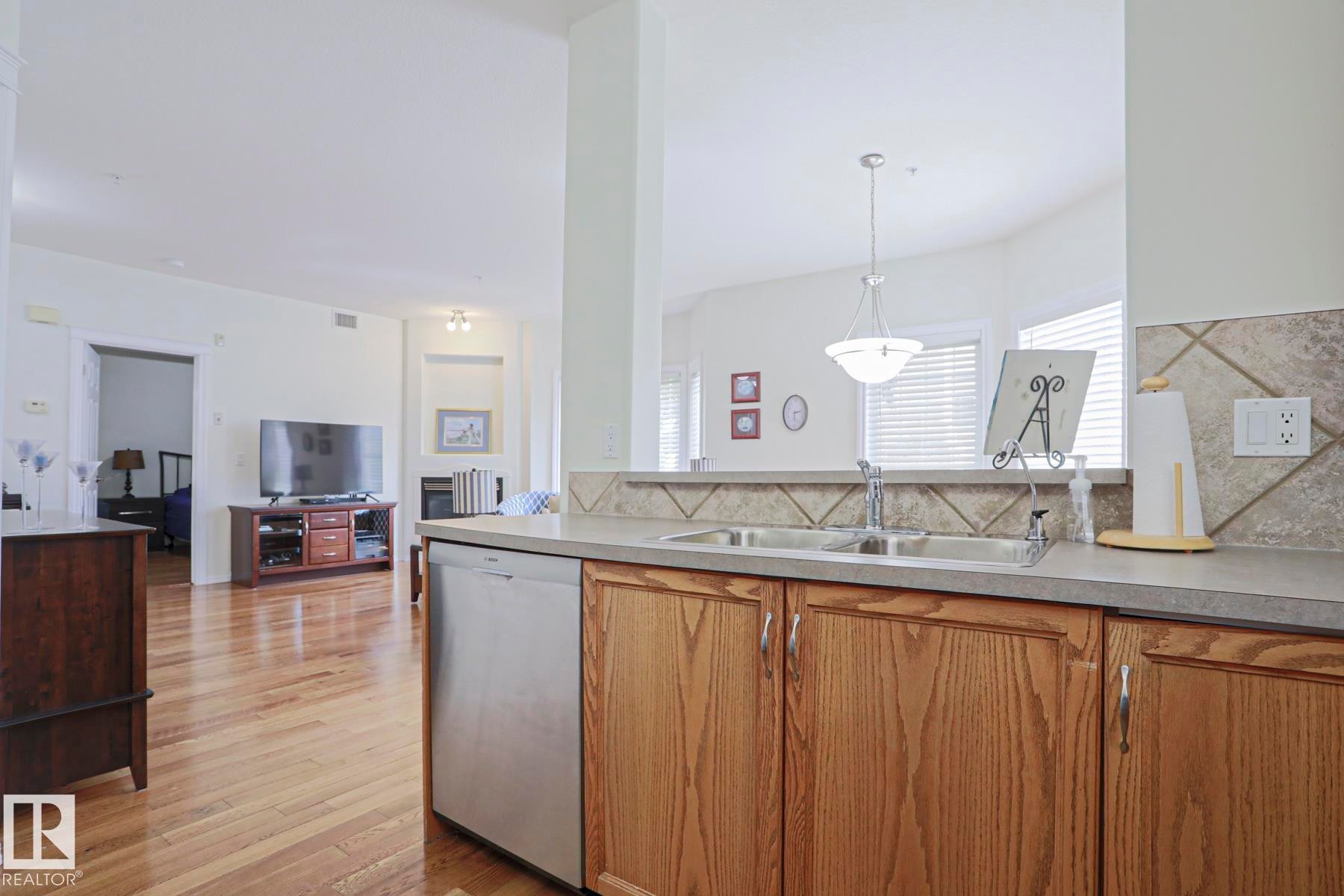#131 11260 153 Av Nw, Edmonton, AB - Indoor Photo Showing Kitchen With Double Sink