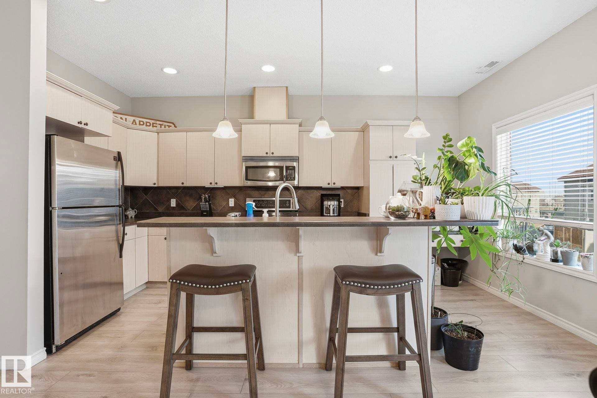 #52 13825 155 Av Nw, Edmonton, AB - Indoor Photo Showing Kitchen With Stainless Steel Kitchen With Upgraded Kitchen
