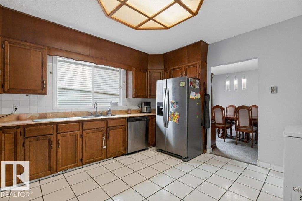 3205 104A Street Nw, Edmonton, AB - Indoor Photo Showing Kitchen With Double Sink