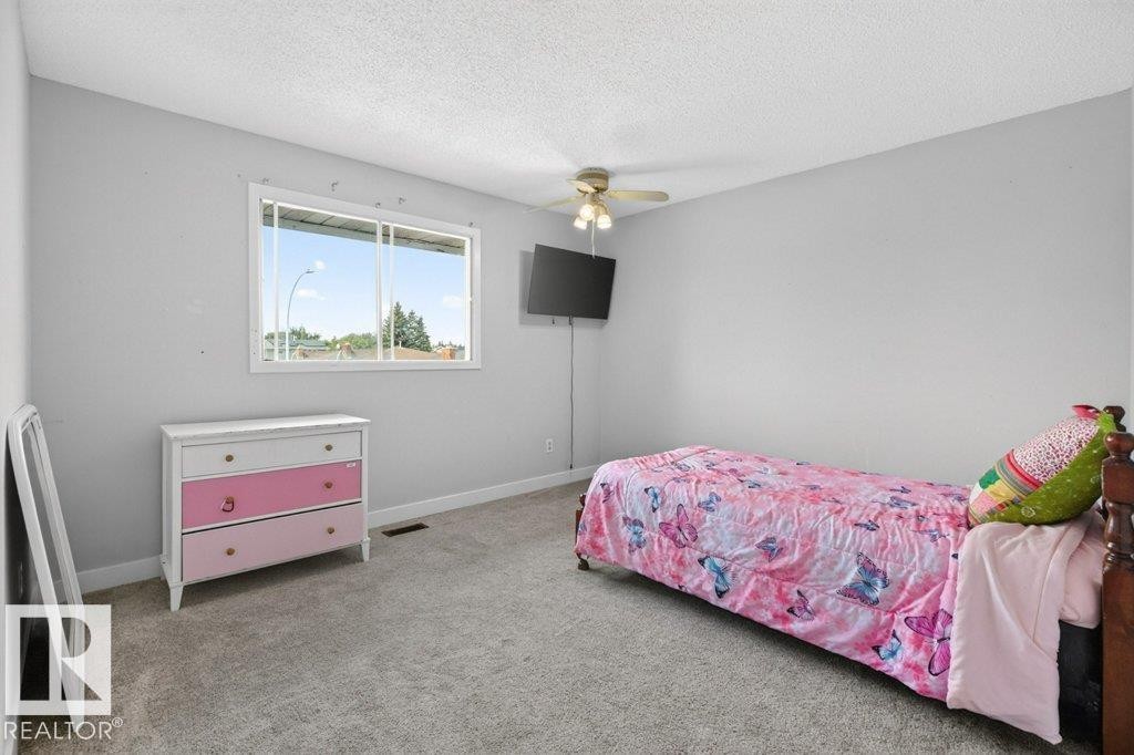 3205 104A Street Nw, Edmonton, AB - Indoor Photo Showing Bedroom