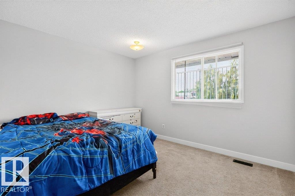 3205 104A Street Nw, Edmonton, AB - Indoor Photo Showing Bedroom