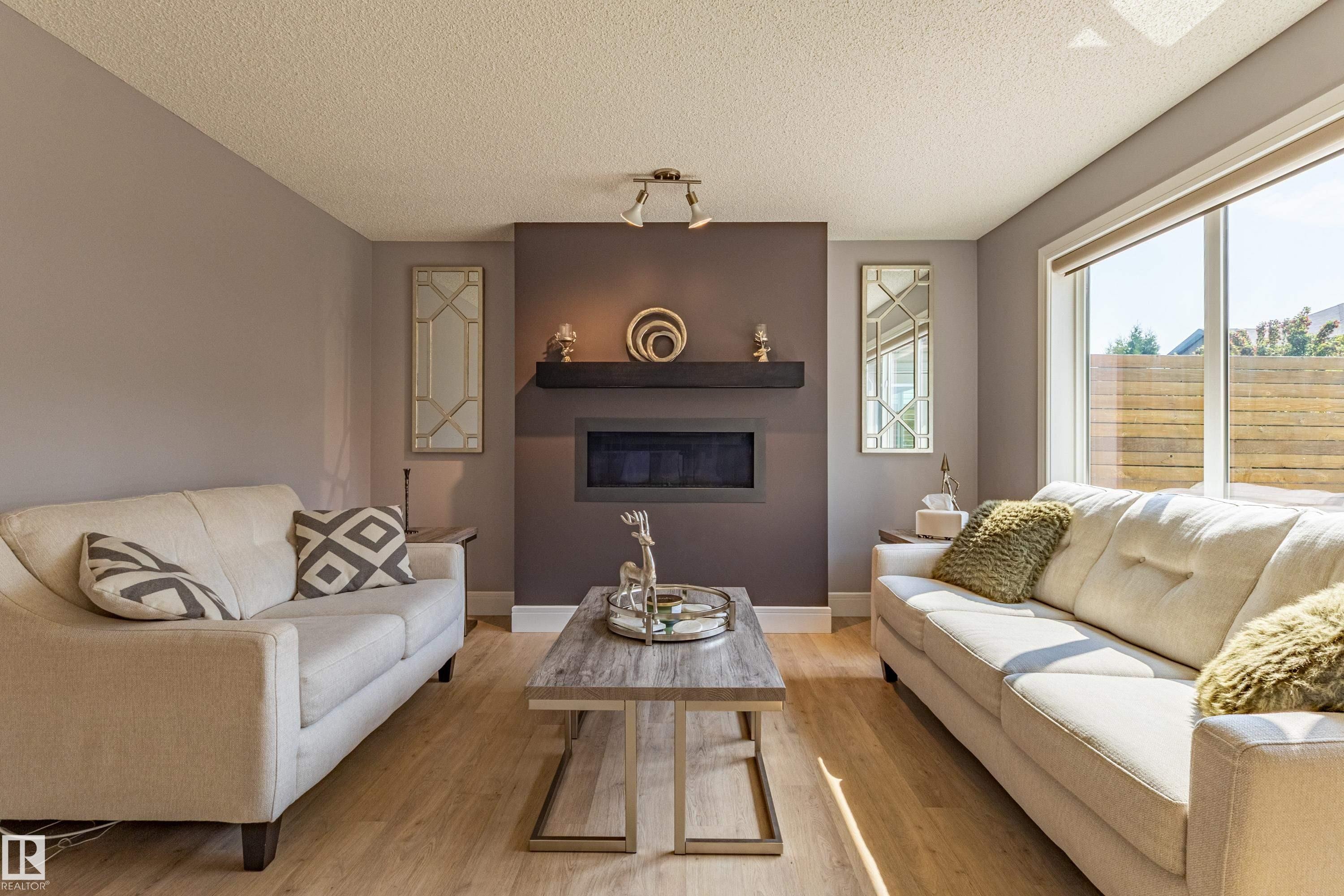 522 174A Street Sw, Edmonton, AB - Indoor Photo Showing Living Room With Fireplace