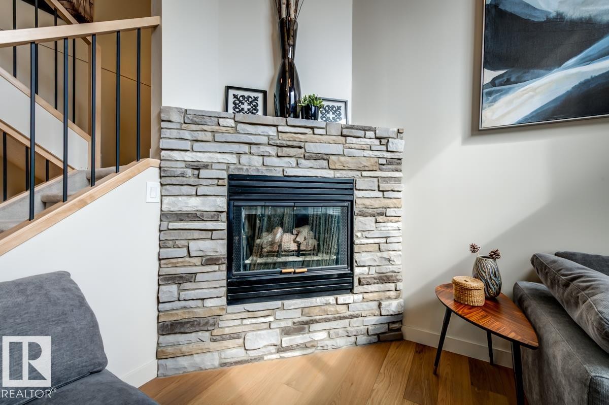 7539 188 Street Nw, Edmonton, AB - Indoor Photo Showing Living Room With Fireplace