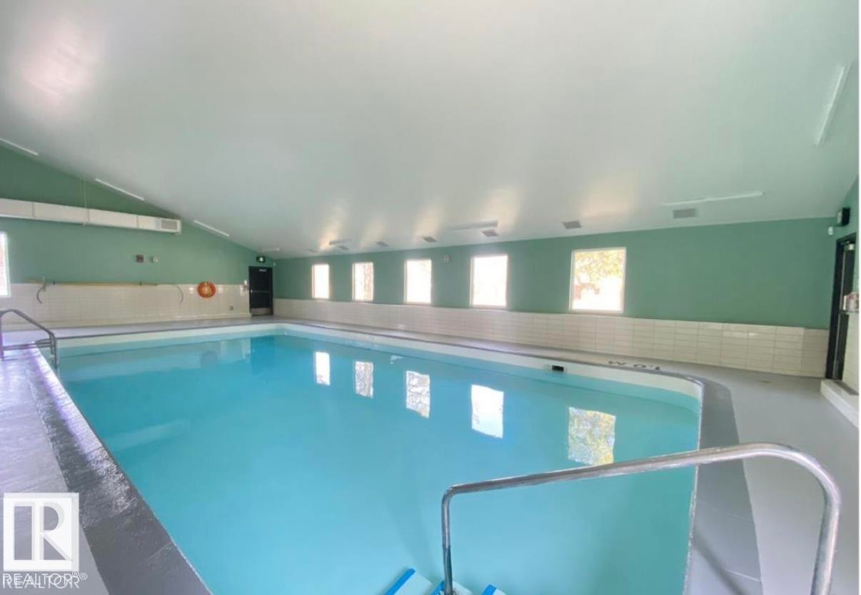 #31 11255 31 Av Nw, Edmonton, AB - Indoor Photo Showing Other Room With In Ground Pool