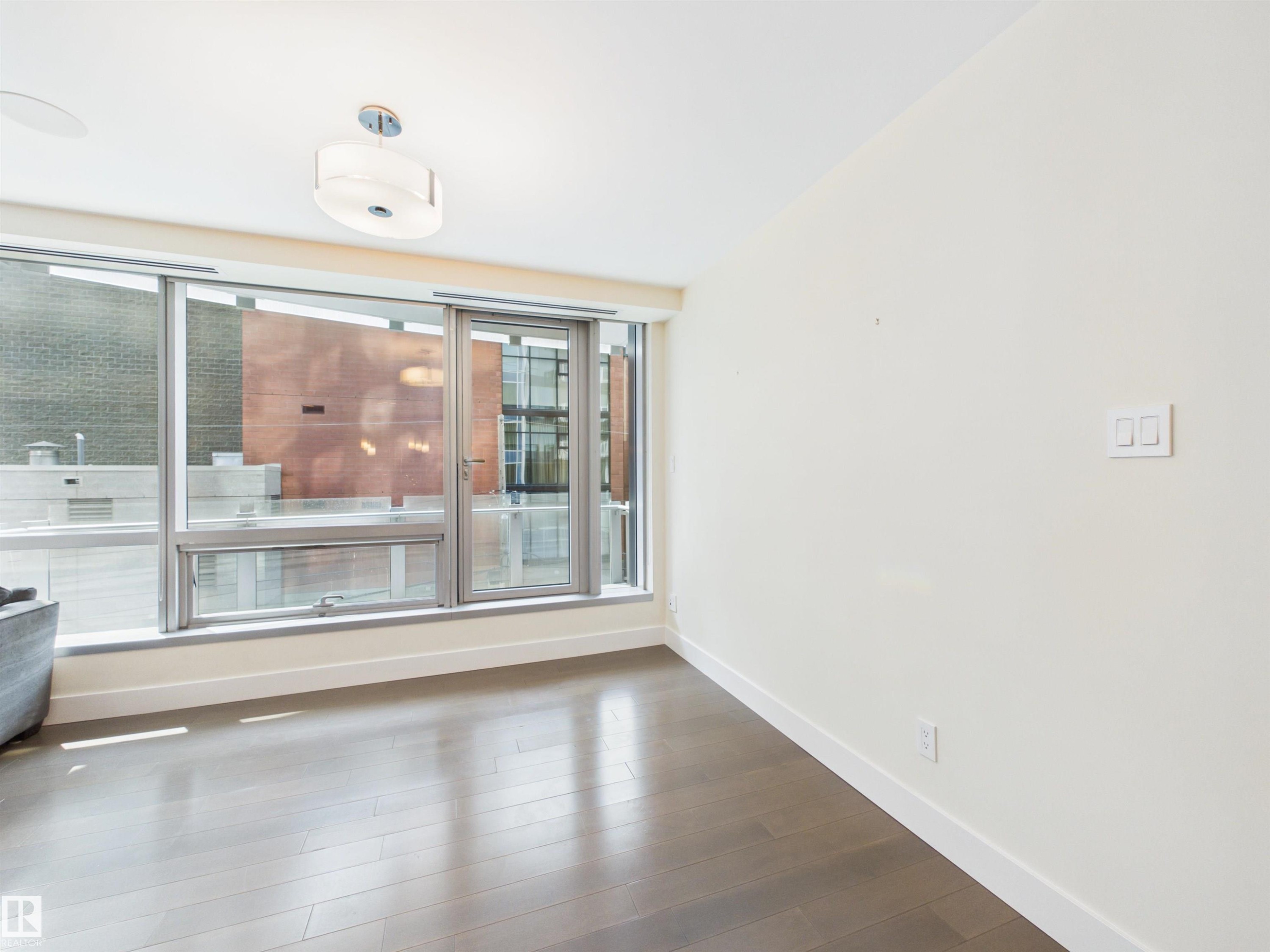 #307 11969 Jasper Av Nw, Edmonton, AB - Indoor Photo Showing Other Room