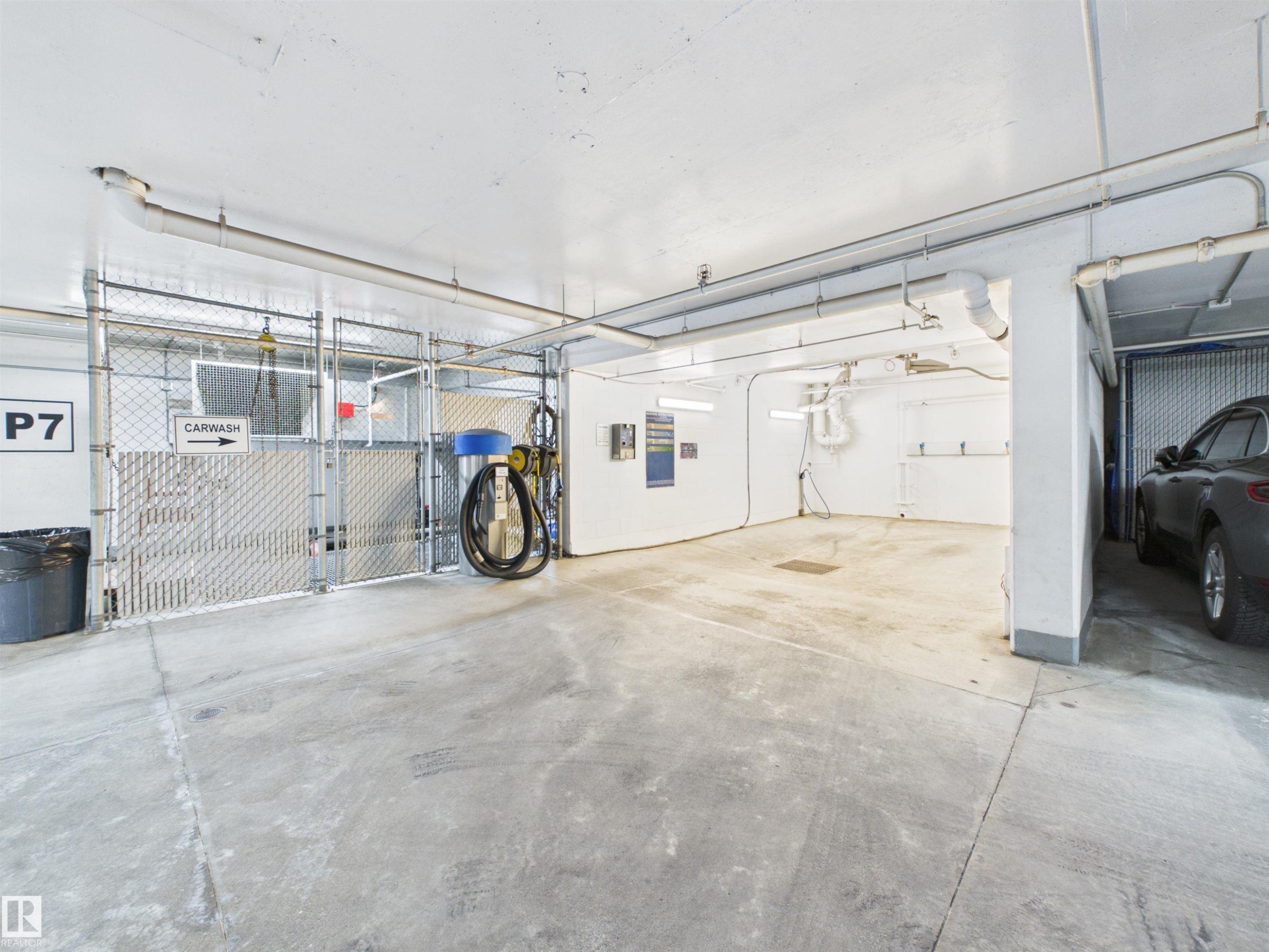 #307 11969 Jasper Av Nw, Edmonton, AB - Indoor Photo Showing Garage