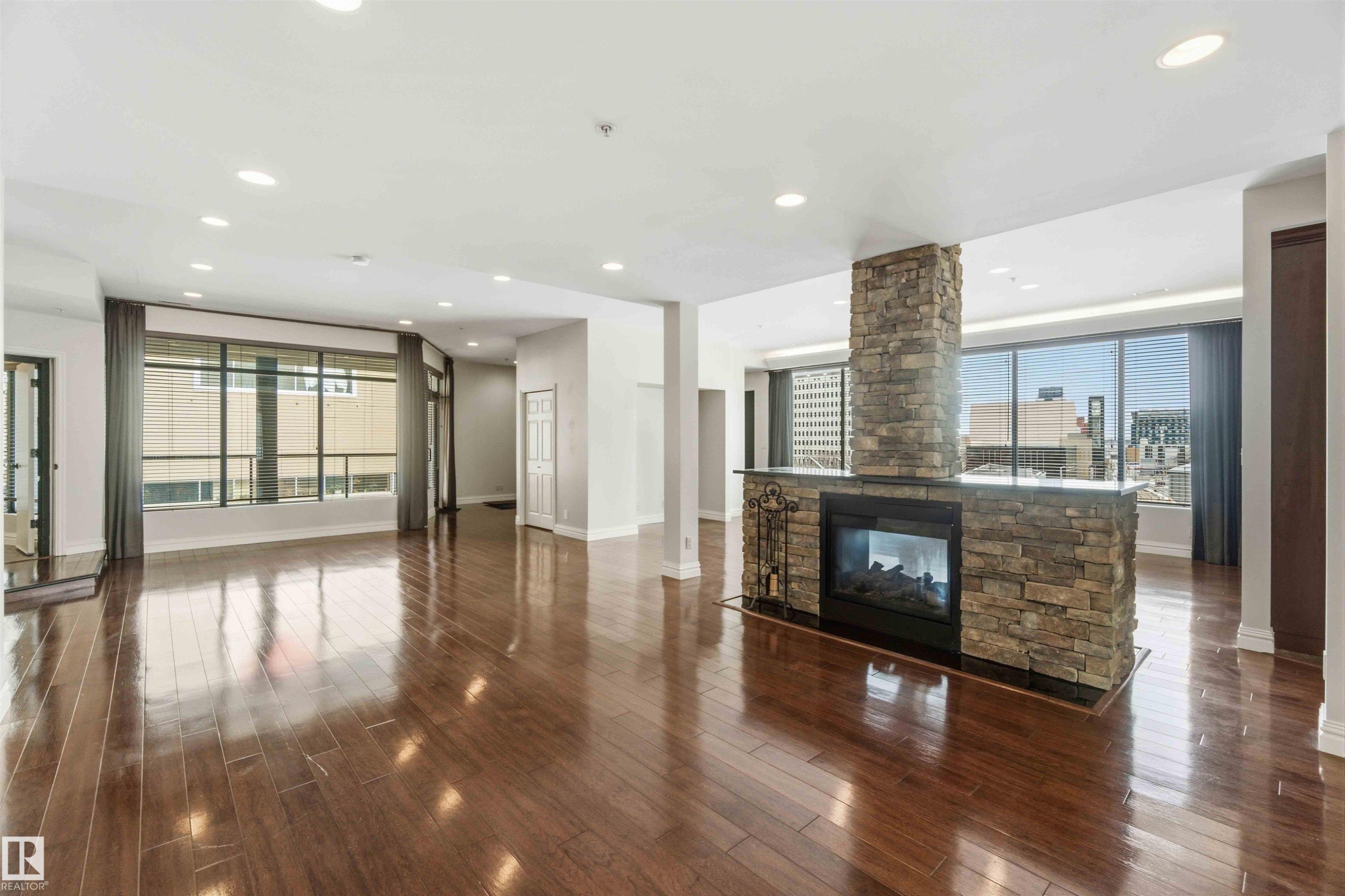 #401 10009 102 Av Nw, Edmonton, AB - Indoor With Fireplace