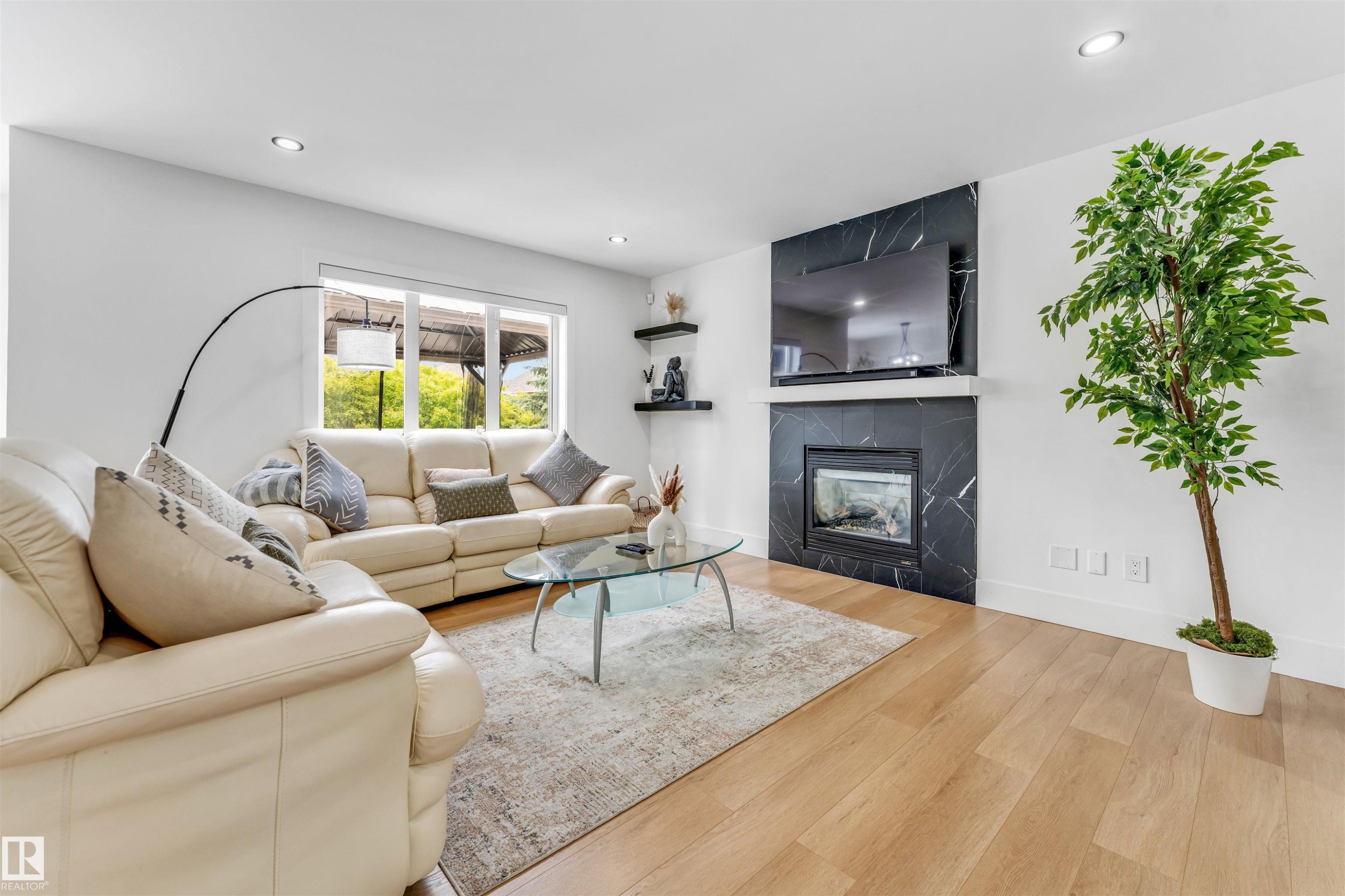 1218 87A Street Sw, Edmonton, AB - Indoor Photo Showing Living Room With Fireplace