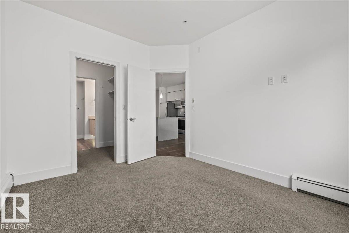 #104 10030 83 Av Nw, Edmonton, AB - Indoor Photo Showing Other Room