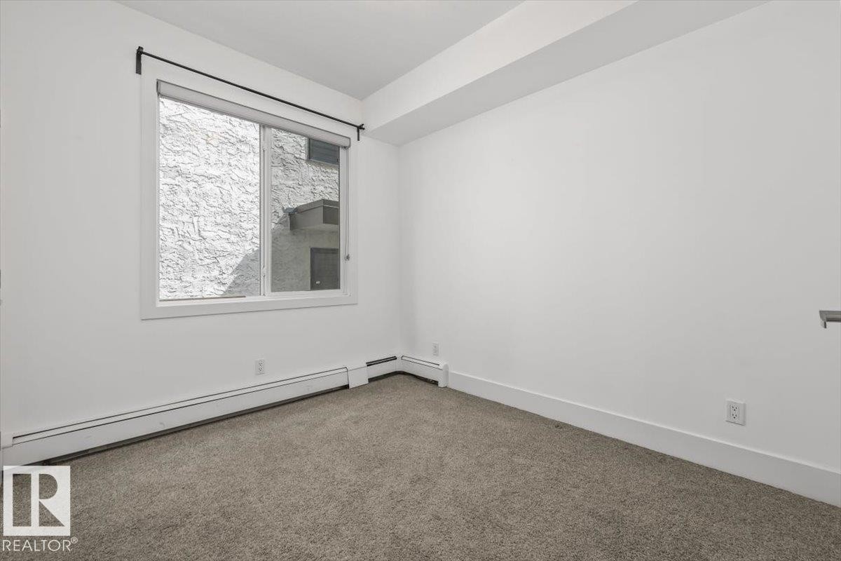 #104 10030 83 Av Nw, Edmonton, AB - Indoor Photo Showing Other Room