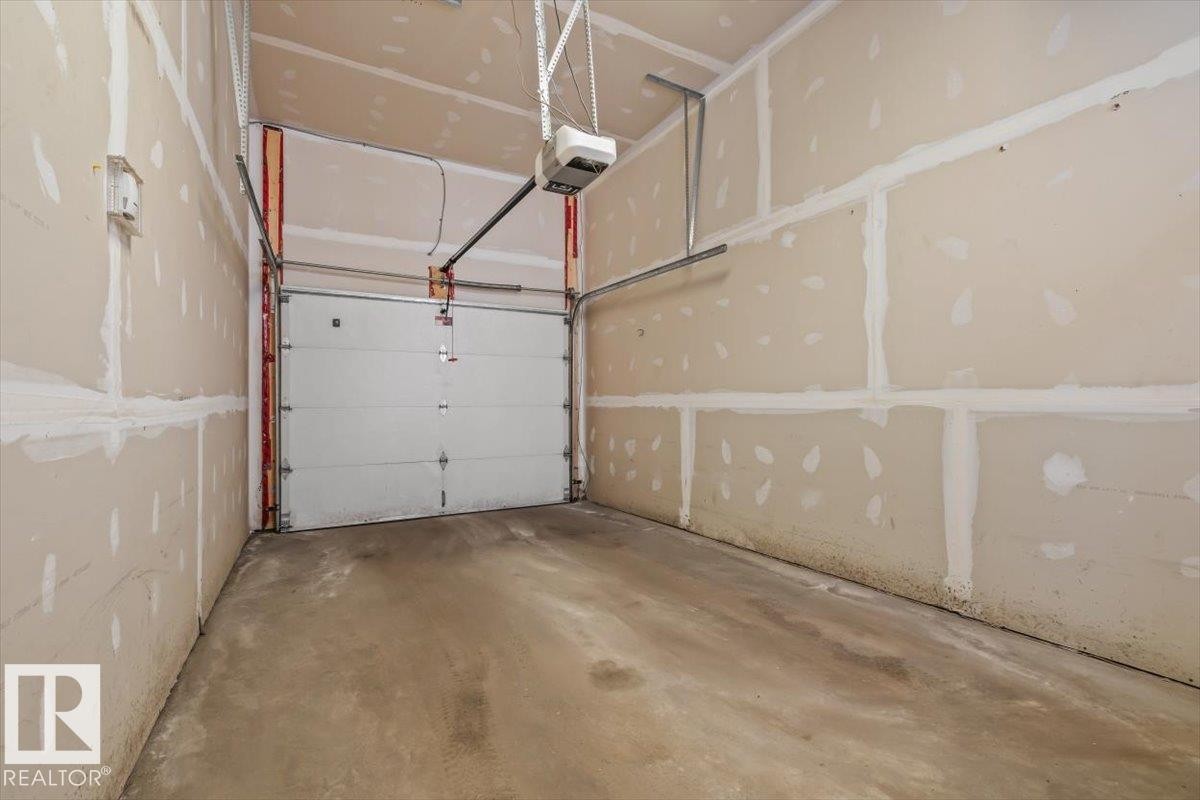 #104 10030 83 Av Nw, Edmonton, AB - Indoor Photo Showing Garage