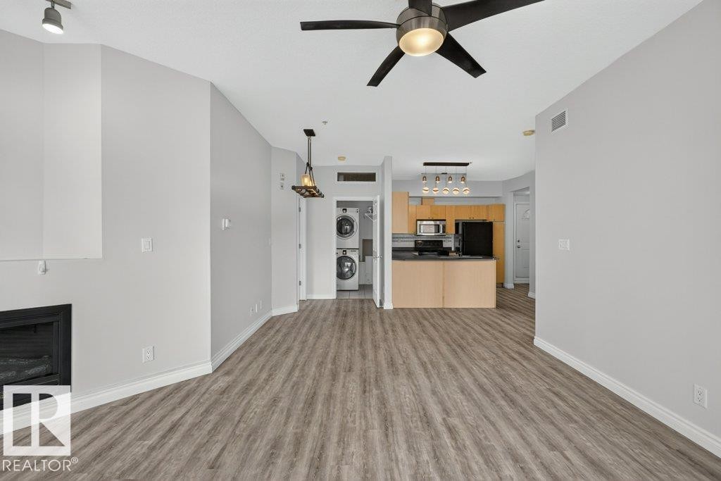 #207 10707 102 Av Nw, Edmonton, AB - Indoor With Fireplace