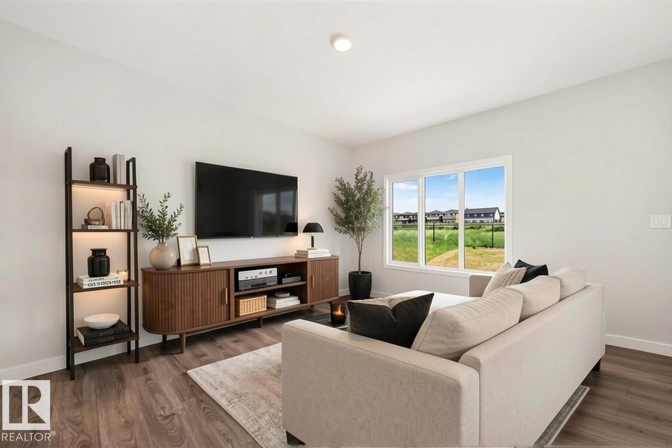 Photo has been virtually staged - 8823 Carson Way Sw, Edmonton, AB - Indoor Photo Showing Living Room