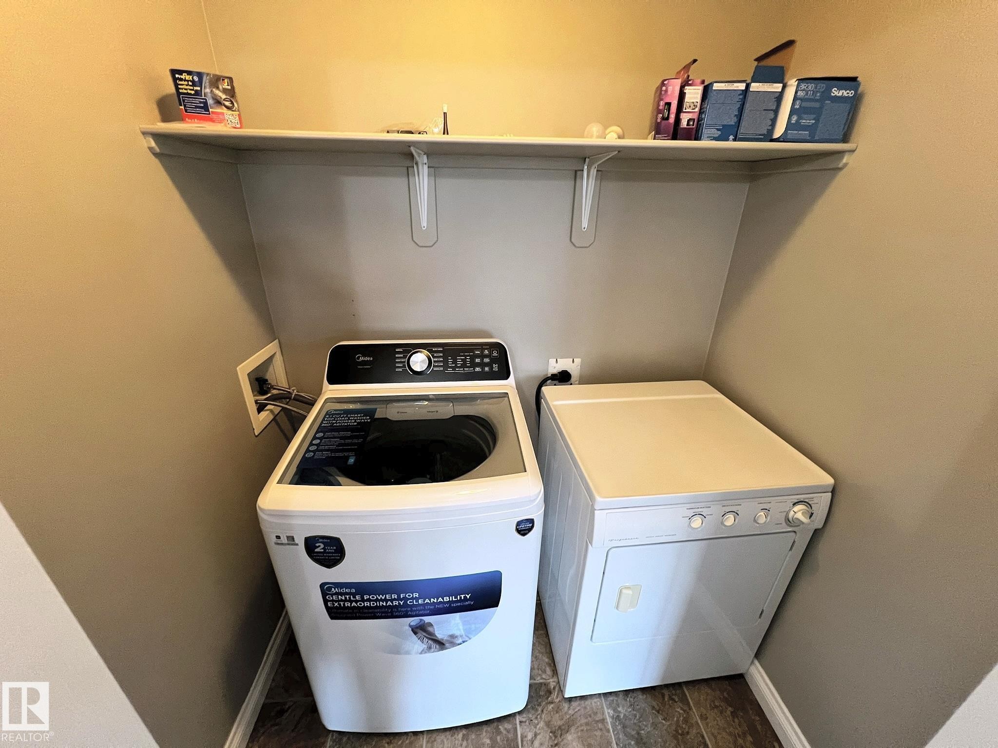 27 Deer Coulee Drive, Didsbury, AB - Indoor Photo Showing Laundry Room