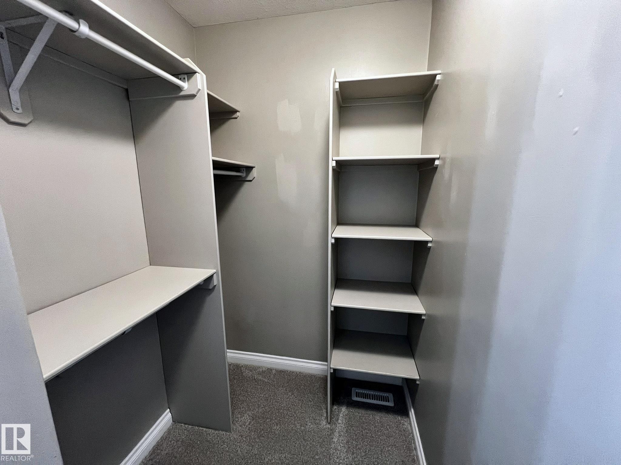 27 Deer Coulee Drive, Didsbury, AB - Indoor With Storage