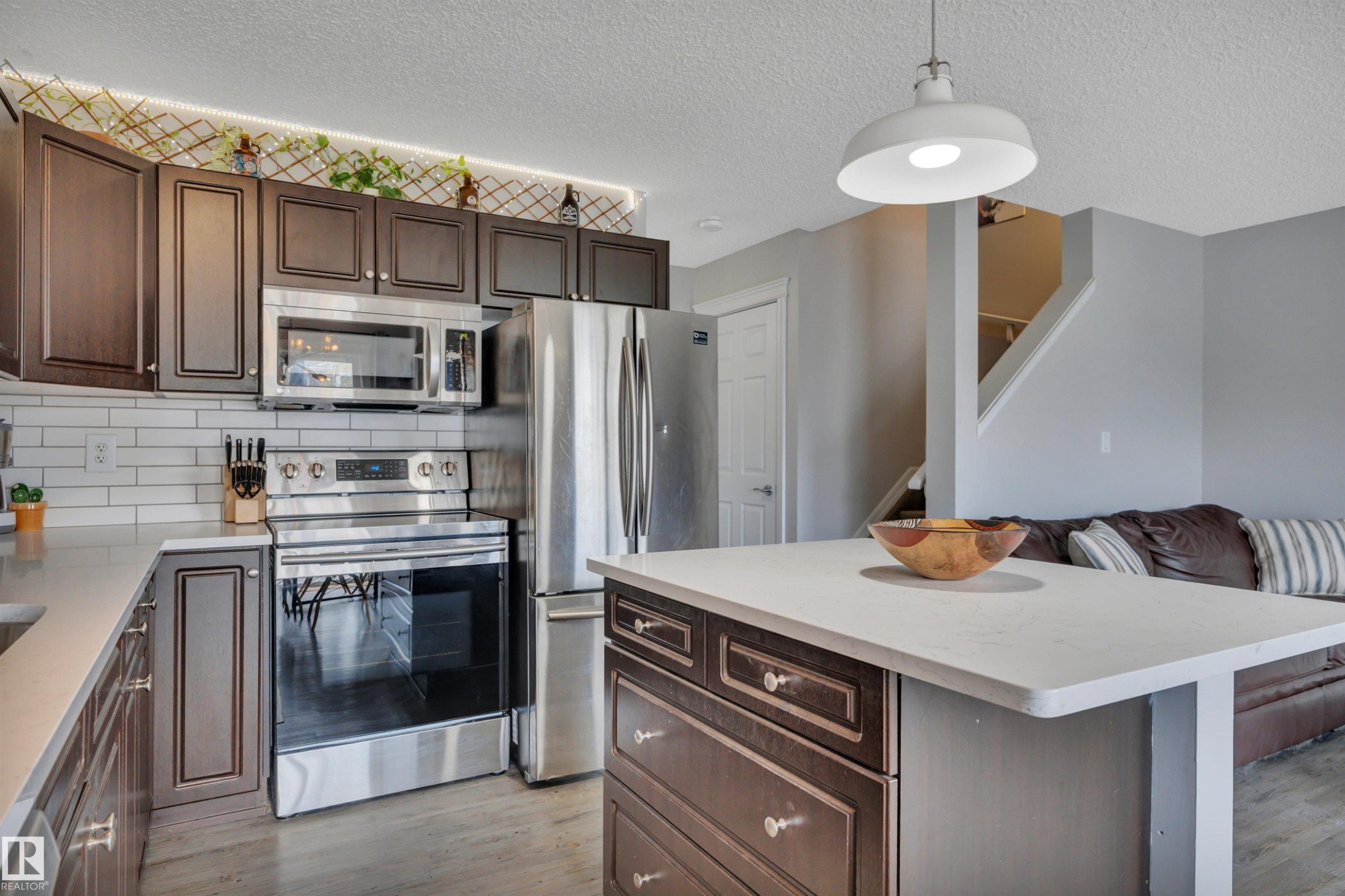 #49 5101 Soleil Bv, Beaumont, AB - Indoor Photo Showing Kitchen