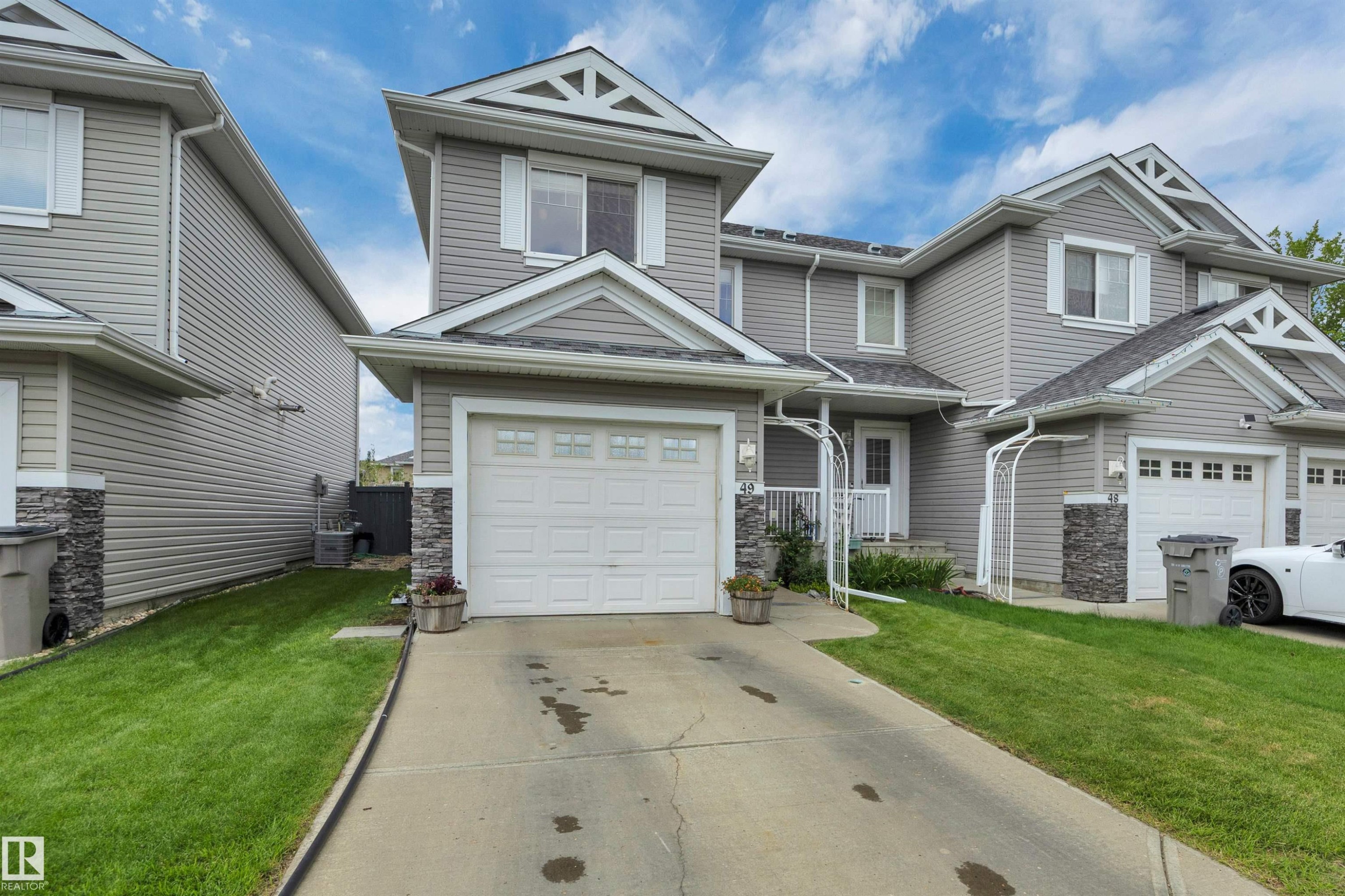 #49 5101 Soleil Bv, Beaumont, AB - Outdoor With Facade
