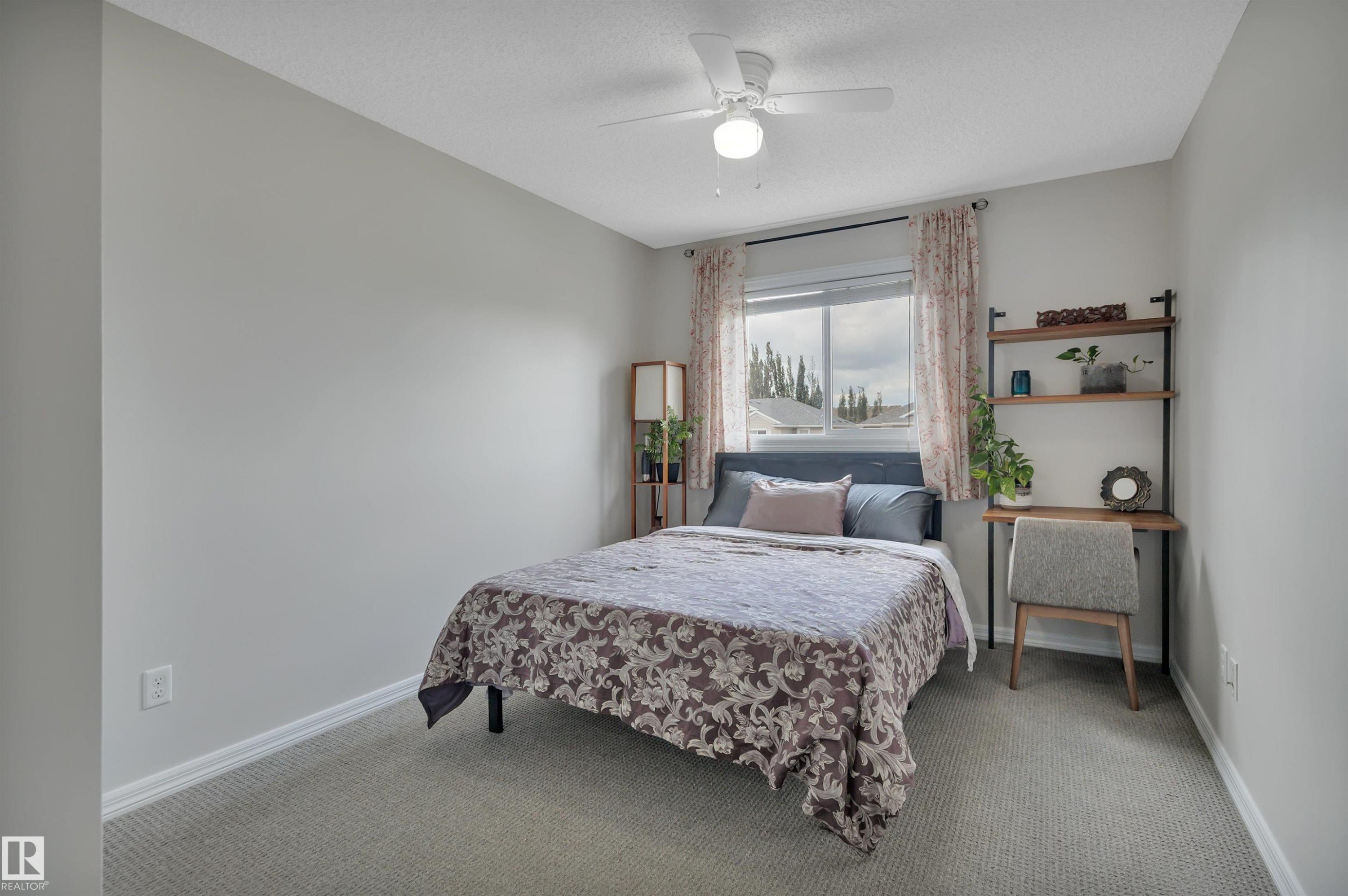#49 5101 Soleil Bv, Beaumont, AB - Indoor Photo Showing Bedroom