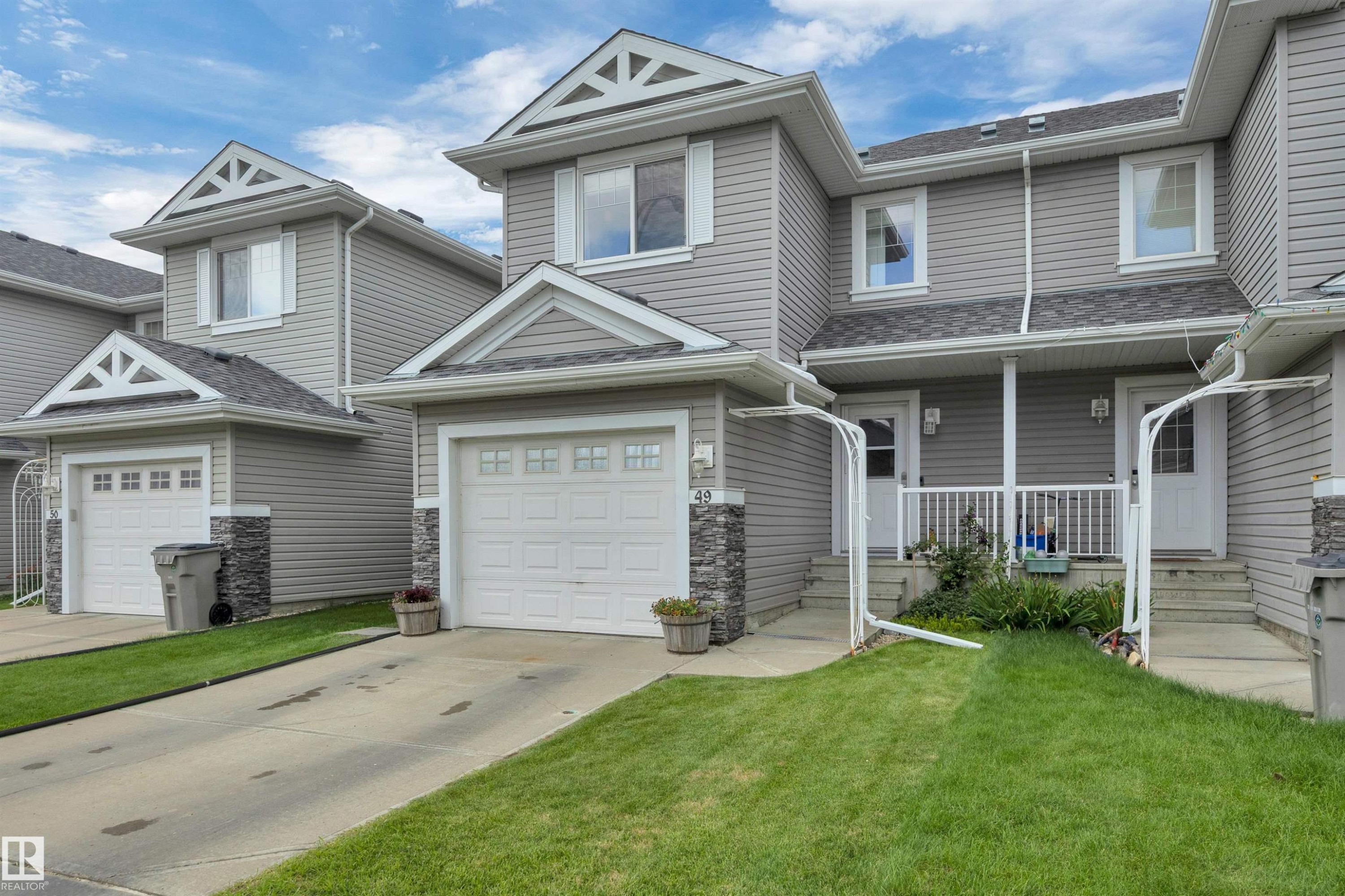 #49 5101 Soleil Bv, Beaumont, AB - Outdoor With Facade