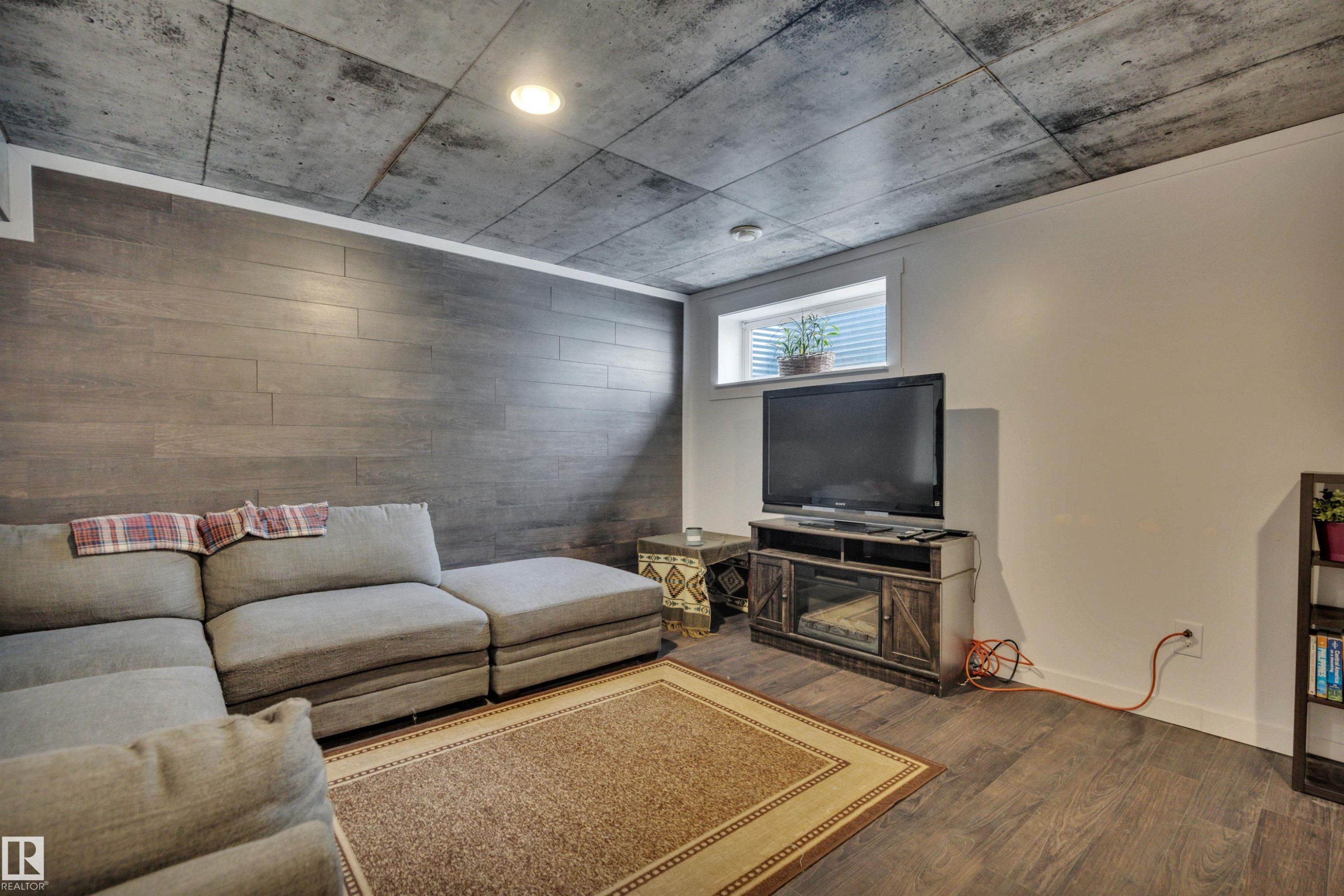 #49 5101 Soleil Bv, Beaumont, AB - Indoor With Fireplace