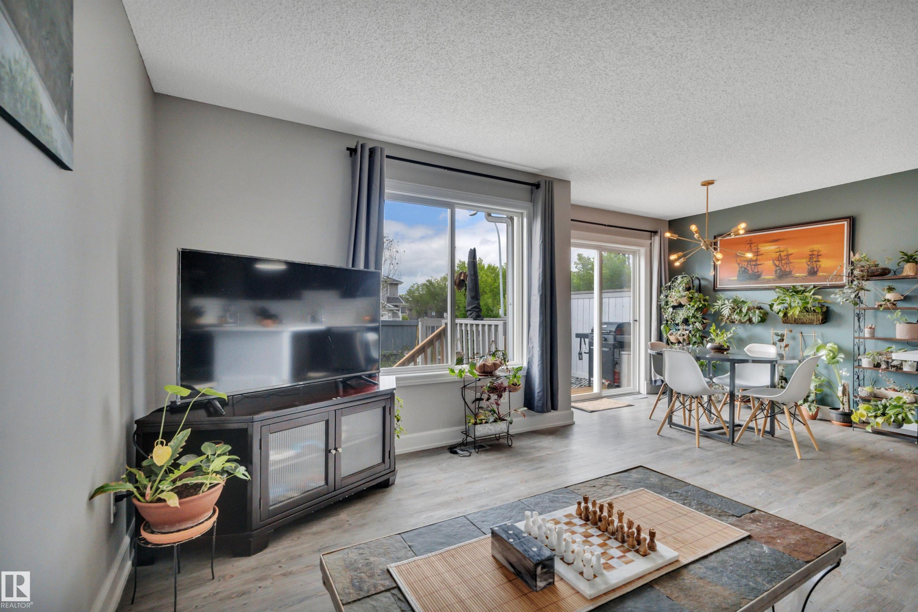 #49 5101 Soleil Bv, Beaumont, AB - Indoor Photo Showing Living Room