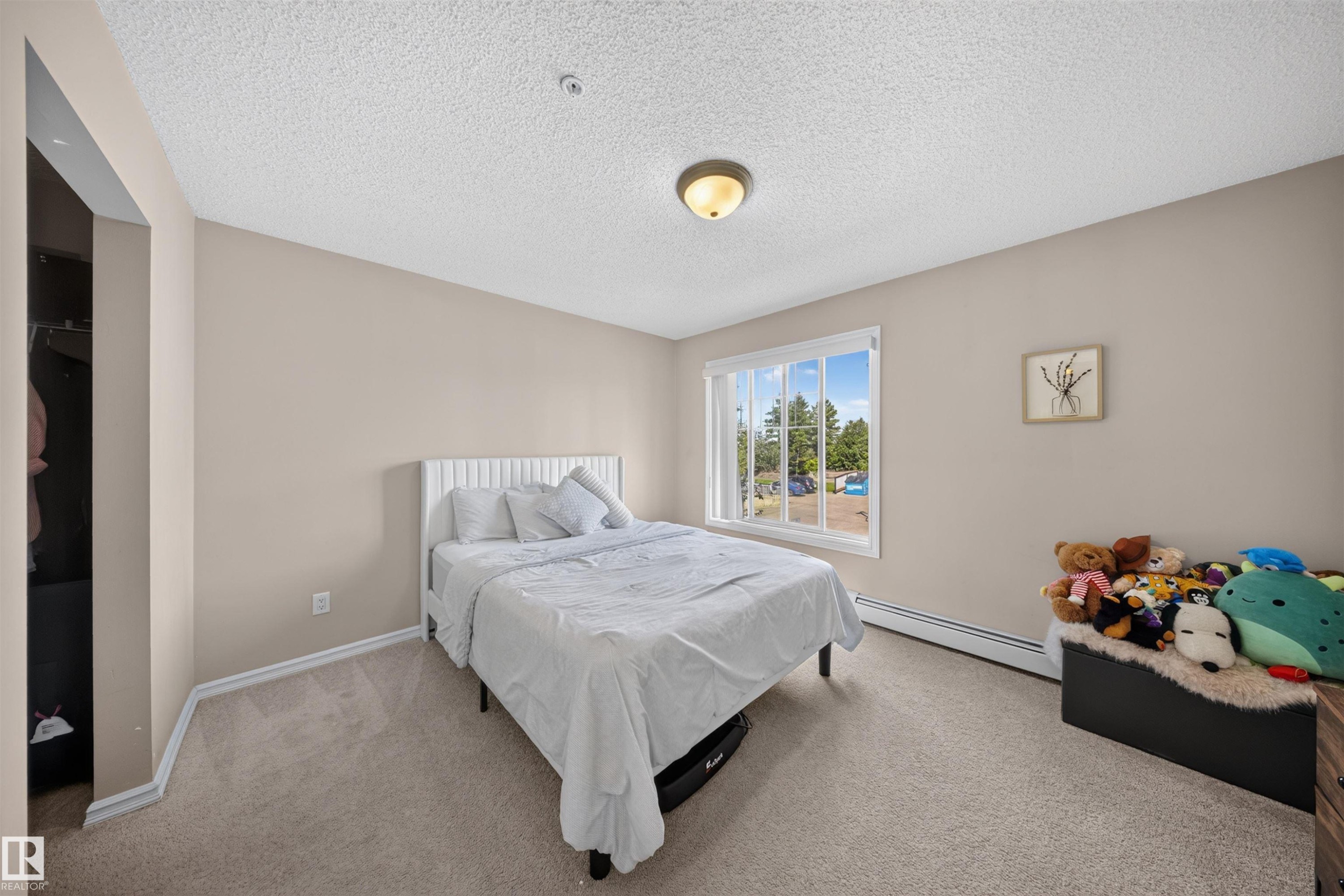 #215 4403 23 St Nw, Edmonton, AB - Indoor Photo Showing Bedroom