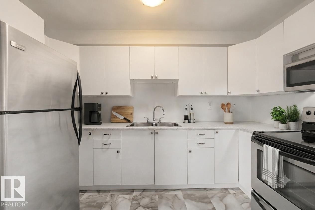 14541 121 Street Nw, Edmonton, AB - Indoor Photo Showing Kitchen With Stainless Steel Kitchen With Double Sink