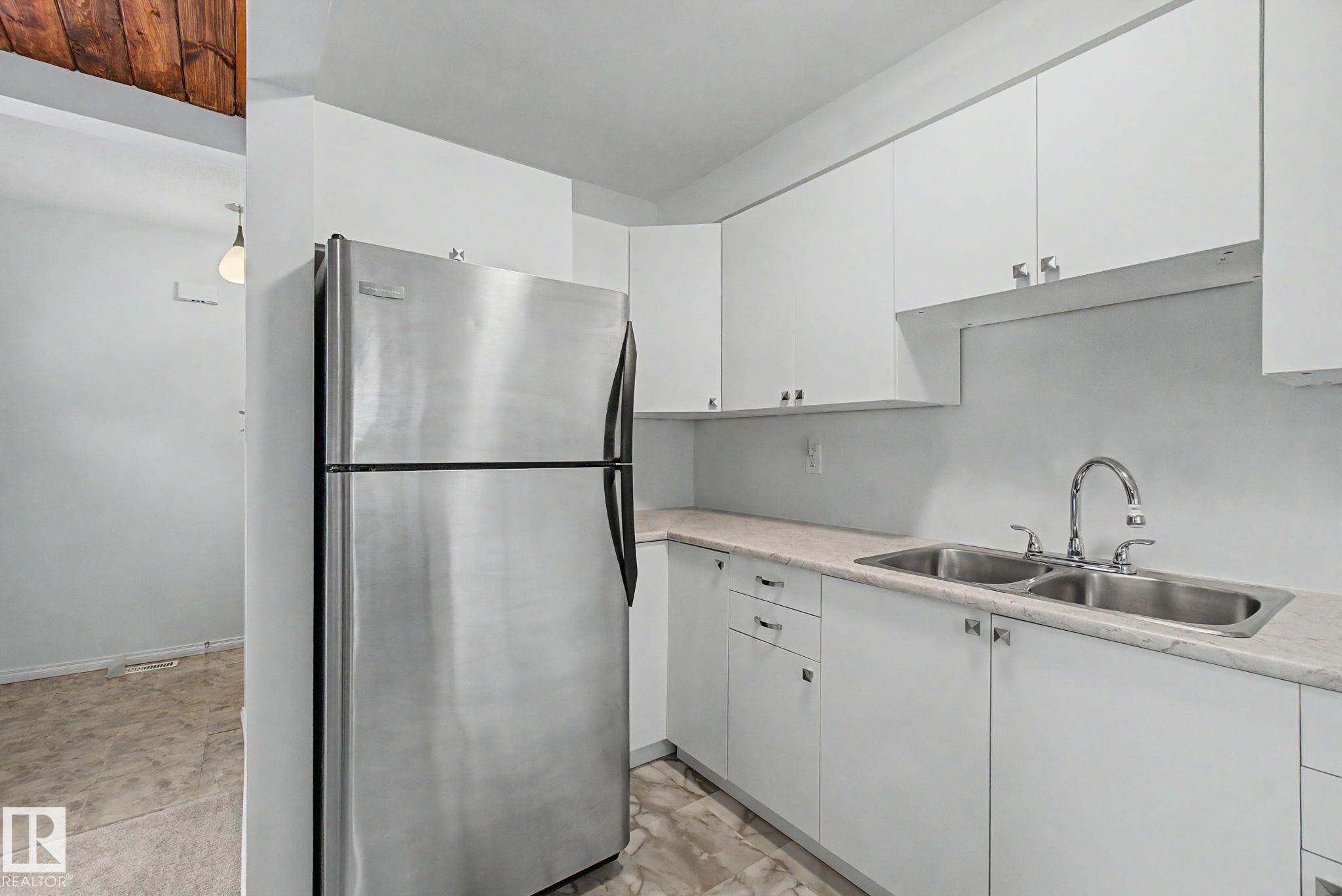 14541 121 Street Nw, Edmonton, AB - Indoor Photo Showing Kitchen With Stainless Steel Kitchen With Double Sink