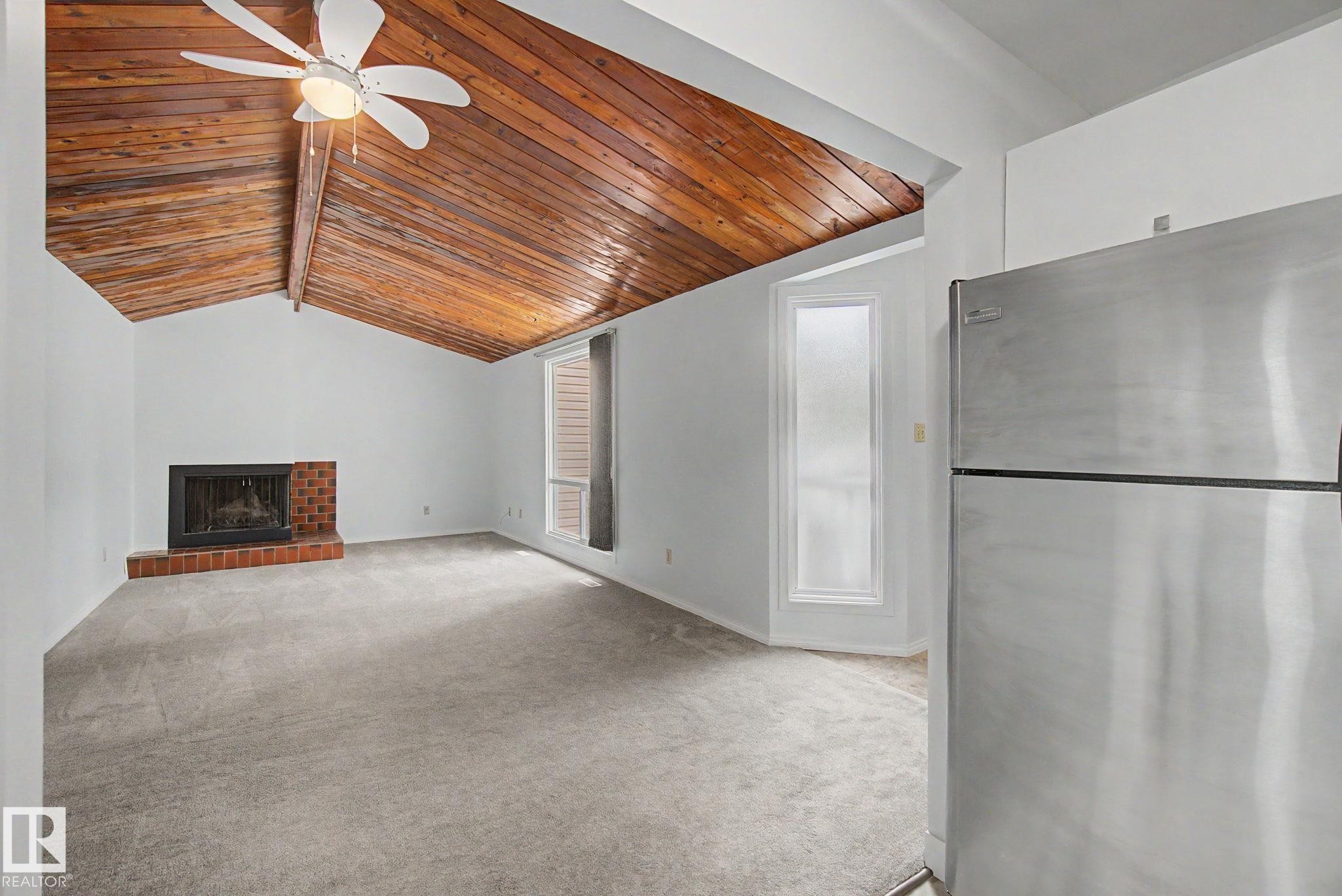 14541 121 Street Nw, Edmonton, AB - Indoor Photo Showing Other Room With Fireplace