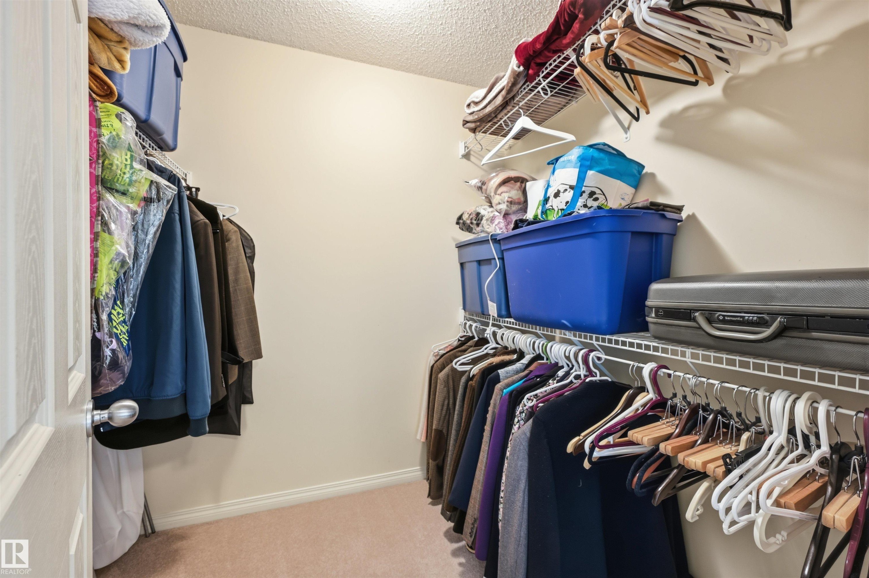 Closet in Primary bedroom. - 1516 76 Street Sw, Edmonton, AB - Indoor Photo Showing Bedroom