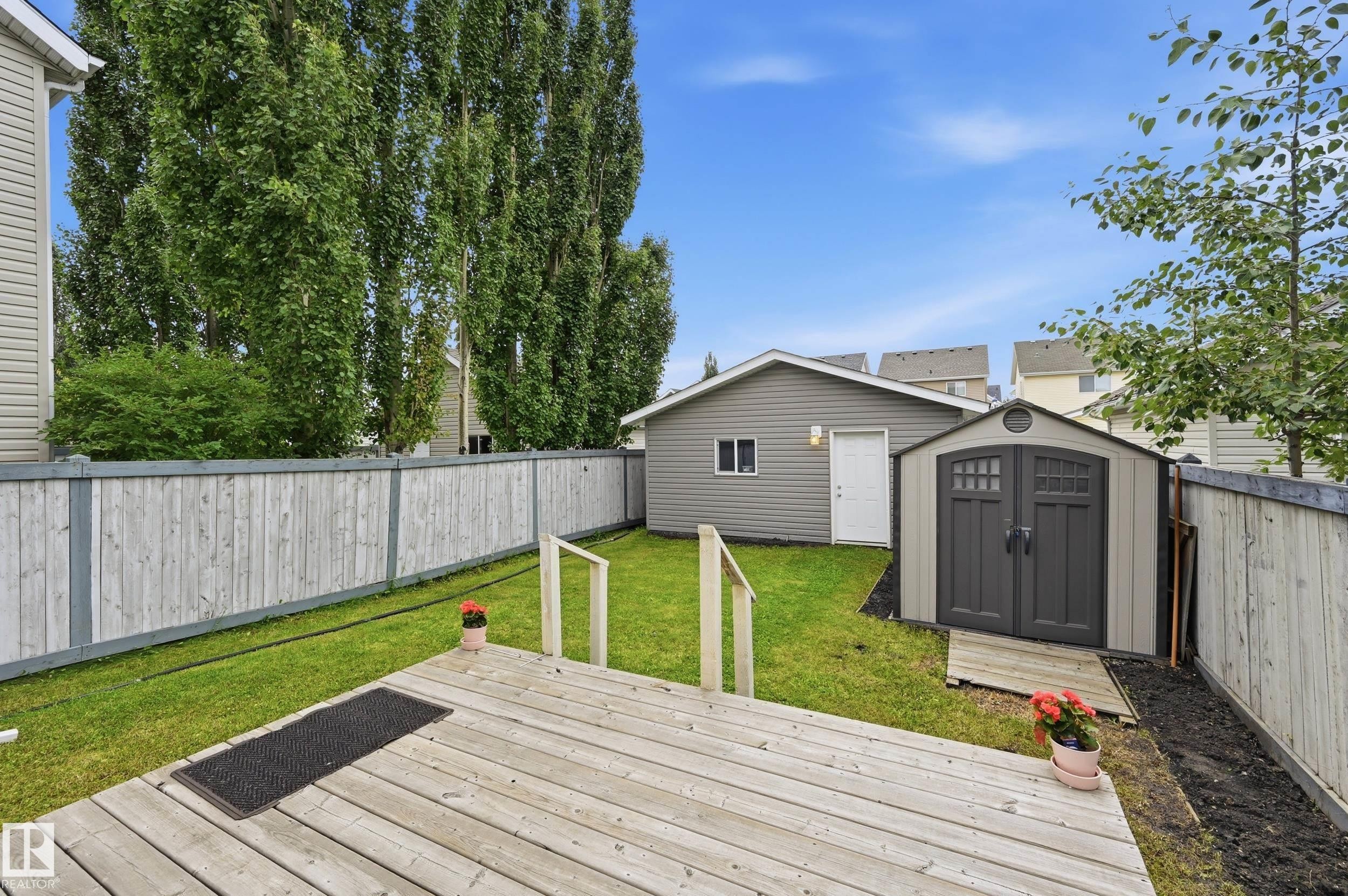 Fully fenced yard with storage shed. - 1516 76 Street Sw, Edmonton, AB - Outdoor With Deck Patio Veranda With Backyard