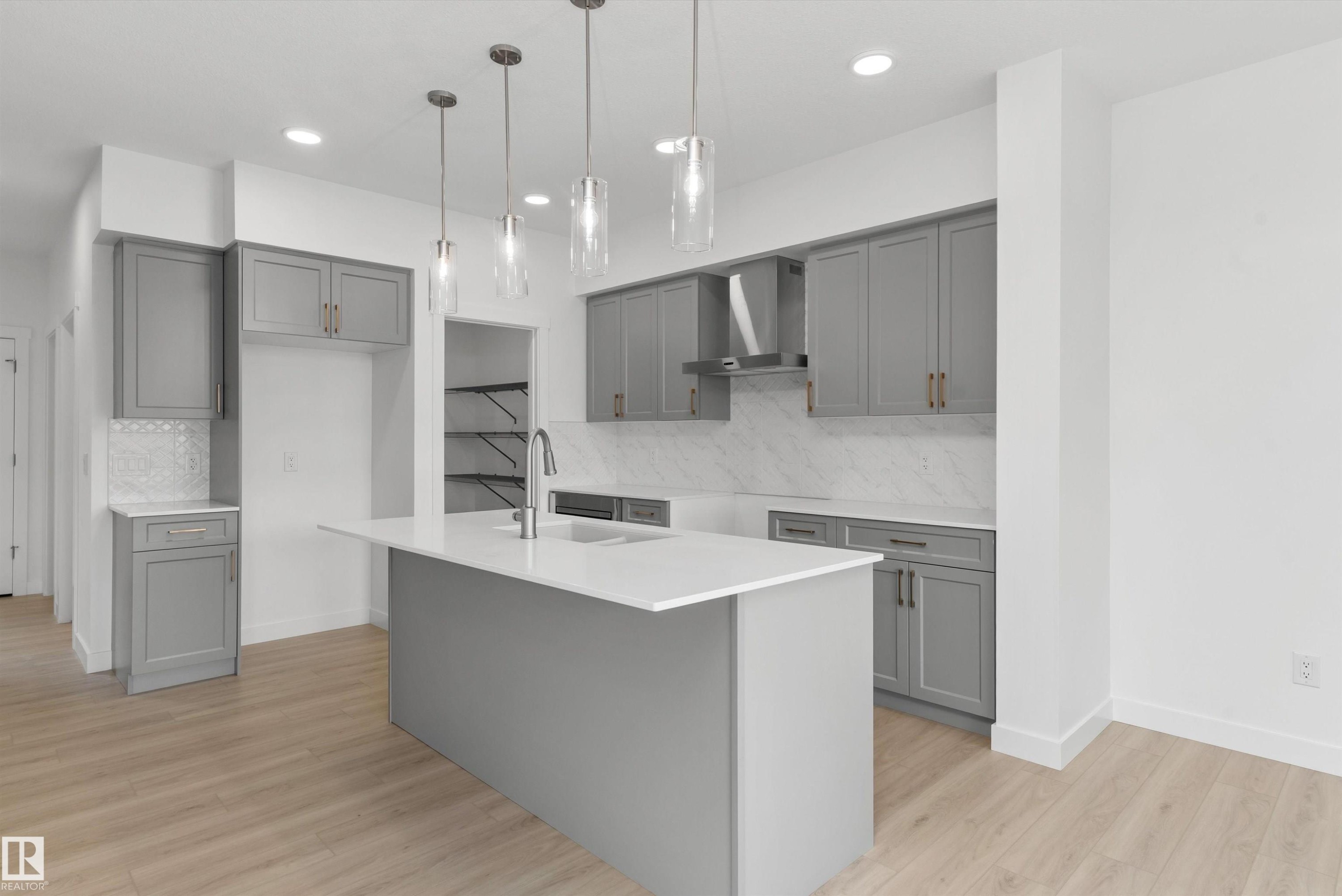 2033 Callihoo Link Sw, Edmonton, AB - Indoor Photo Showing Kitchen With Double Sink With Upgraded Kitchen