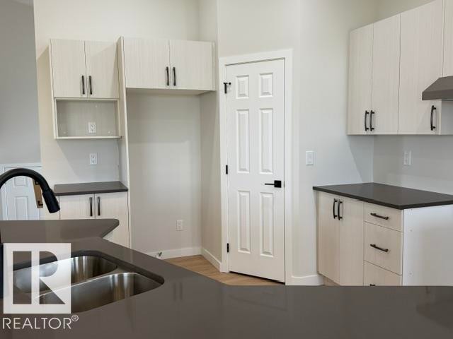 4215 55 Avenue, Lamont, AB - Indoor Photo Showing Kitchen With Double Sink