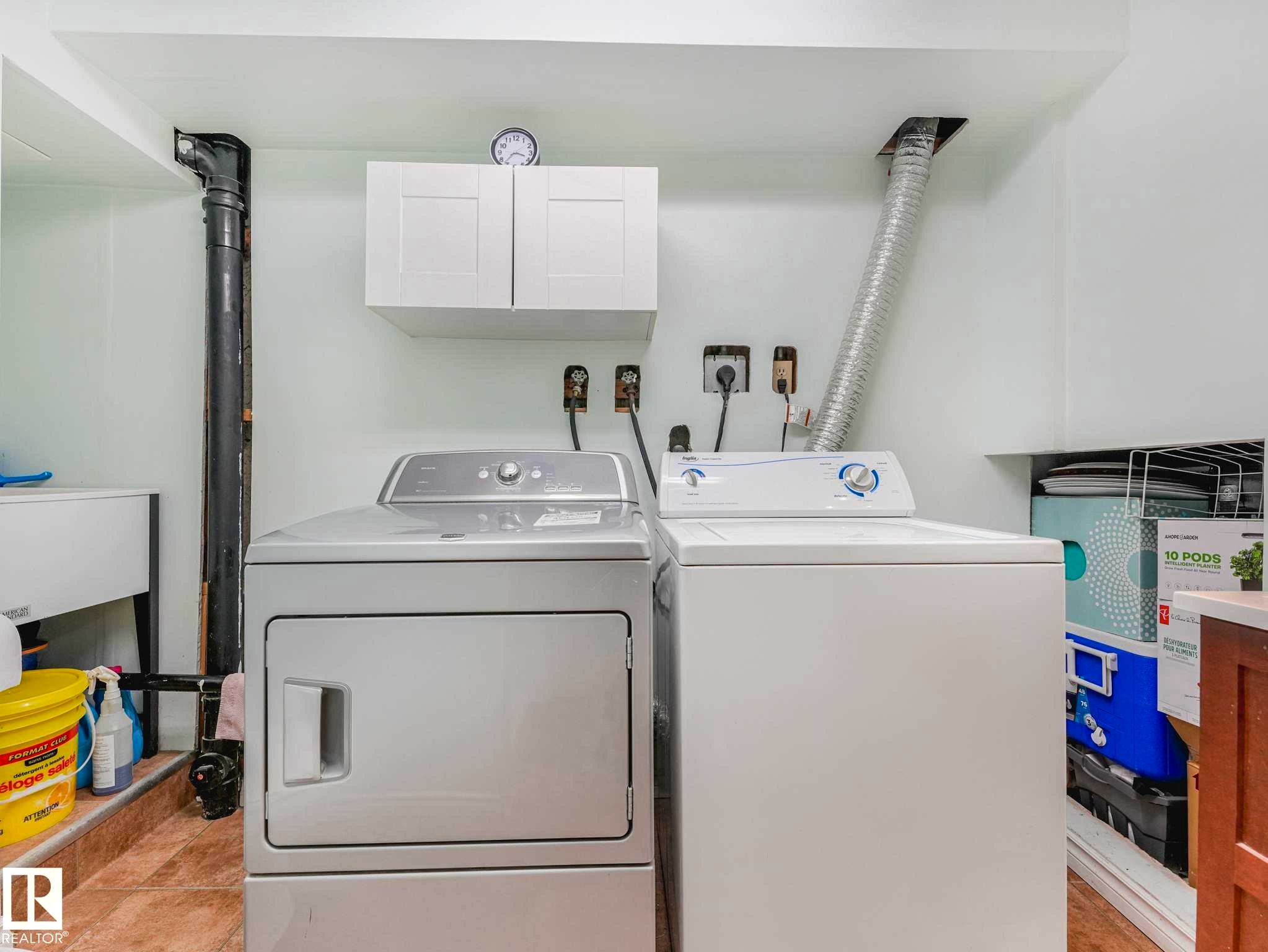 Image quality insufficient for description - 13405 40 St Nw, Edmonton, AB - Indoor Photo Showing Laundry Room