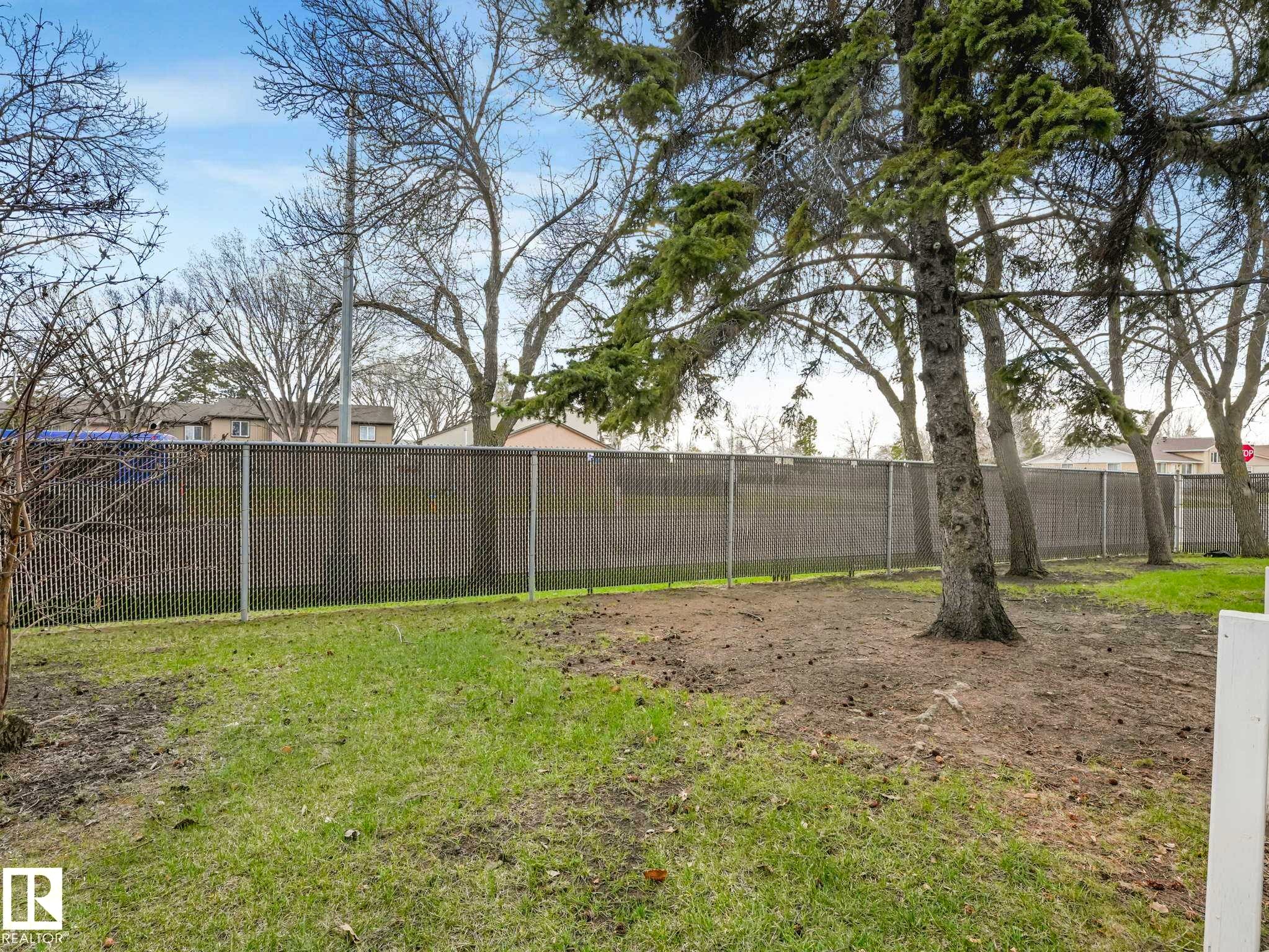 Image quality insufficient for description - 13405 40 St Nw, Edmonton, AB - Outdoor With Backyard