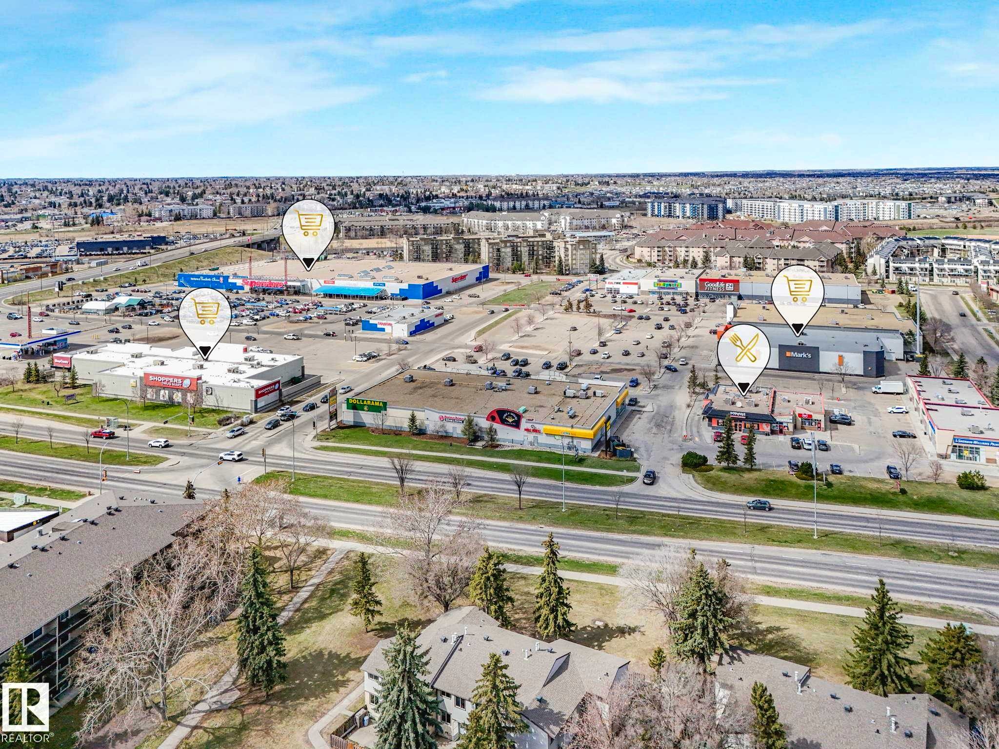 Aerial perspective highlighting a commercial district with multiple retail centers and dining establishments - 13405 40 St Nw, Edmonton, AB - Outdoor With View