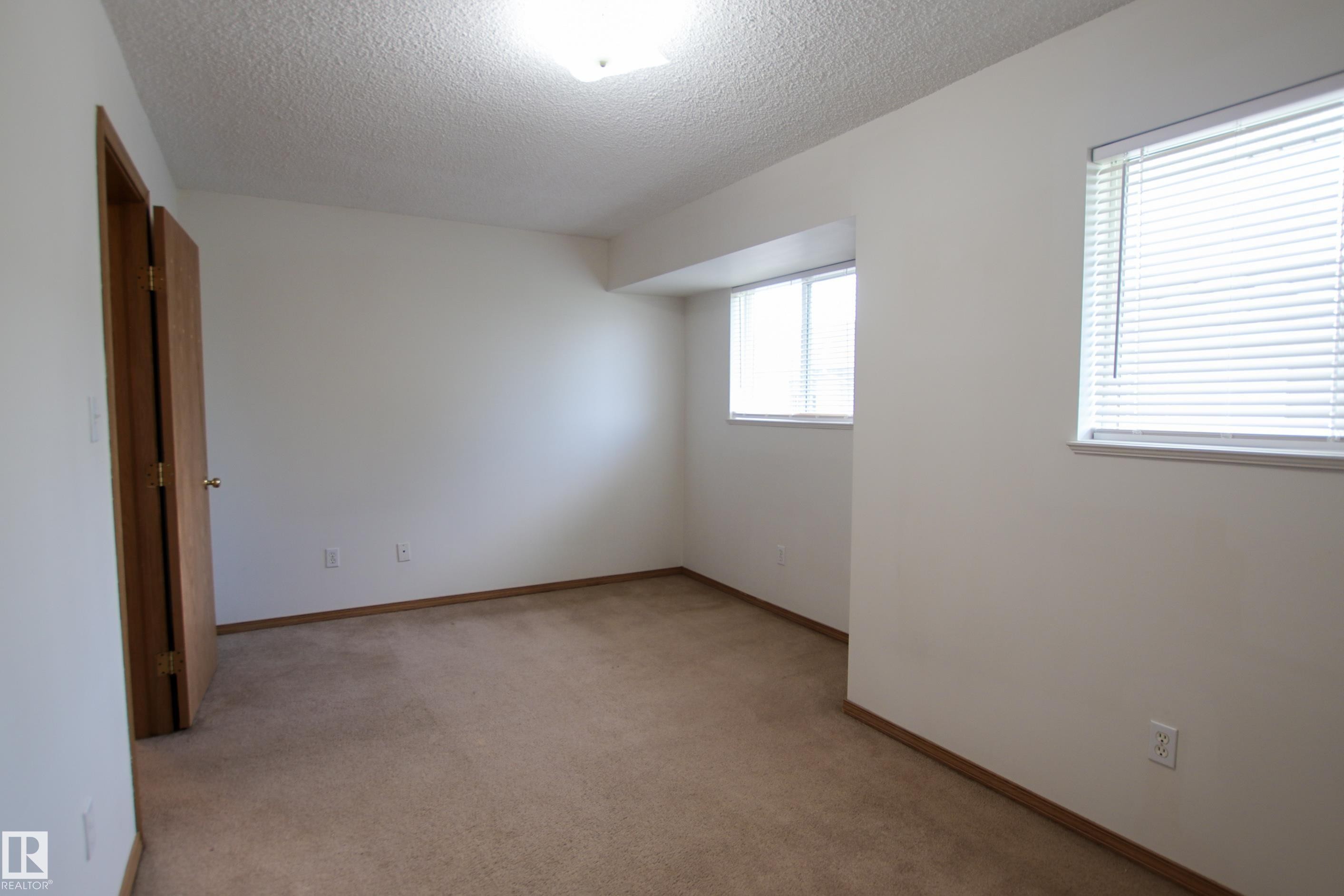 #408 610 King St, Spruce Grove, AB - Indoor Photo Showing Other Room
